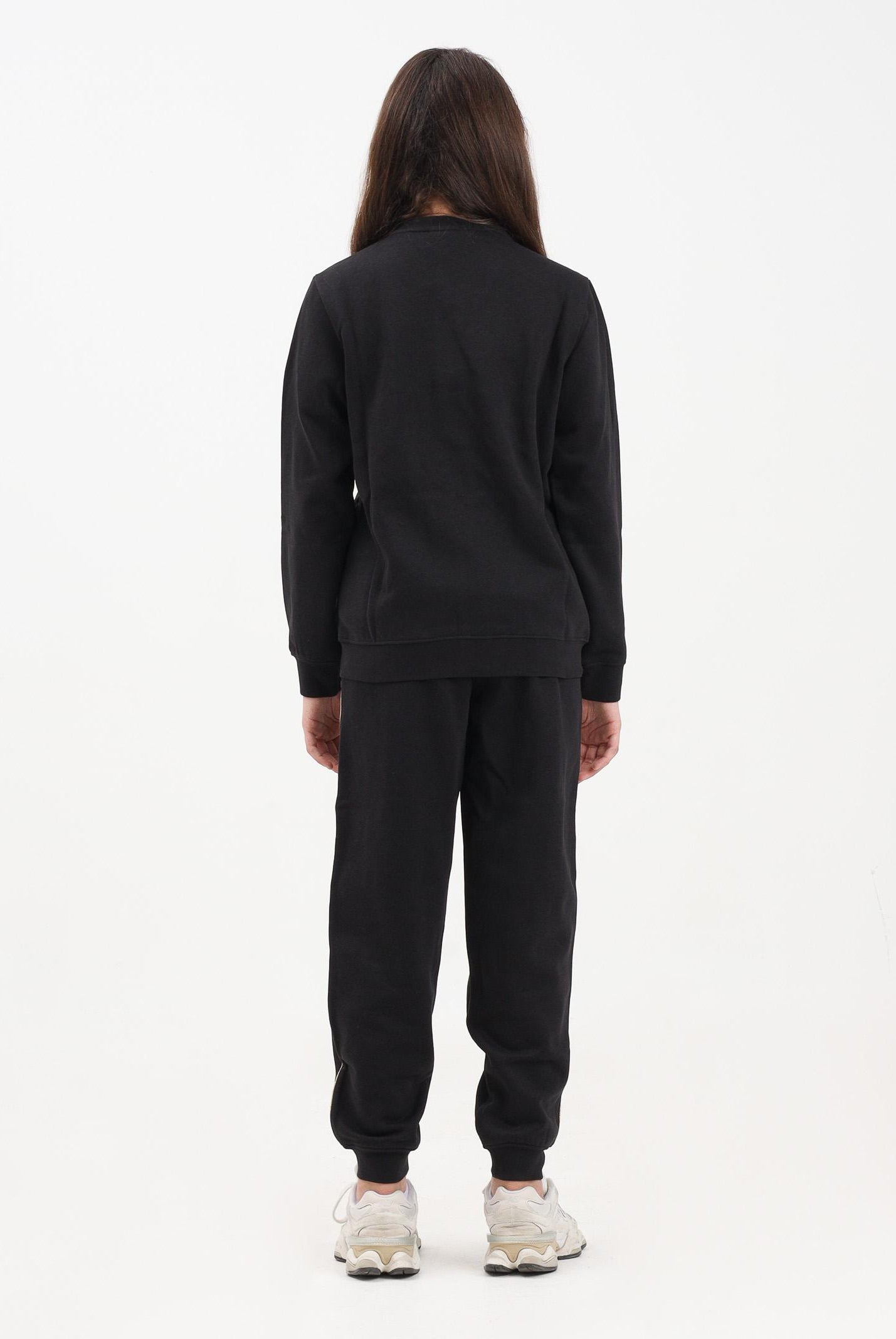 PUMA tuta nera per bambina con dettagli dorati 692212 01 PUMA