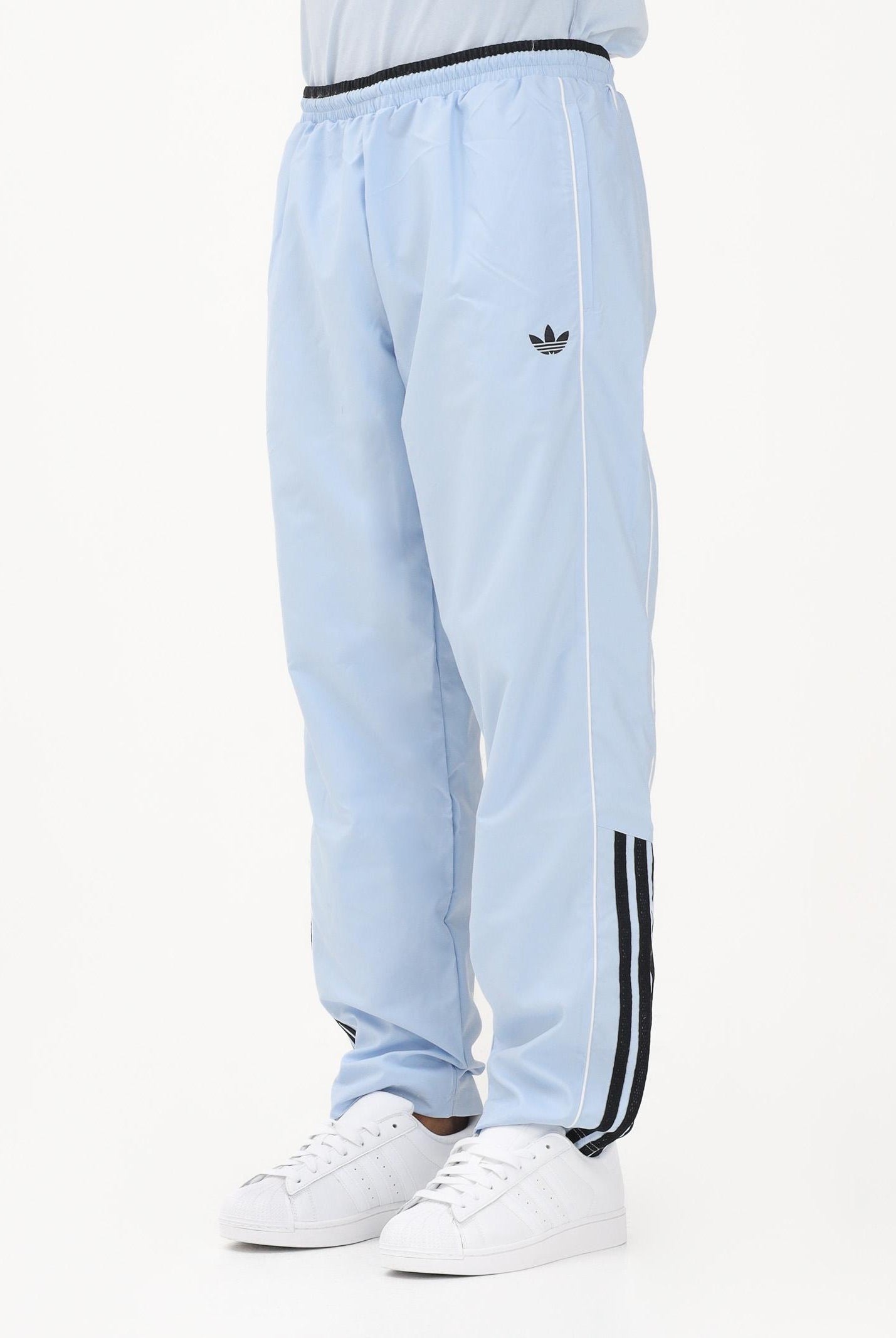 ADIDAS ORIGINALS Pantalone sportivo HALF STRIPES celeste da uomo KE2165 . ADIDAS ORIGINALS