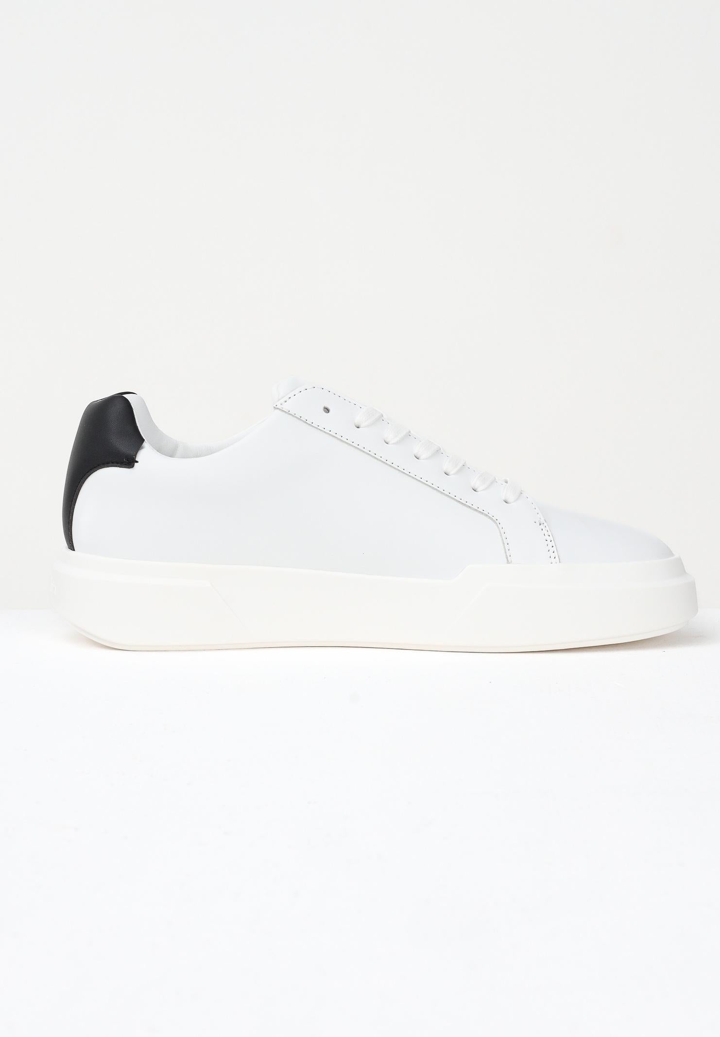 CALVIN KLEIN JEANS Sneakers bianche da uomo con logo e inserto nero YM0YM0134401W . CALVIN KLEIN JEANS