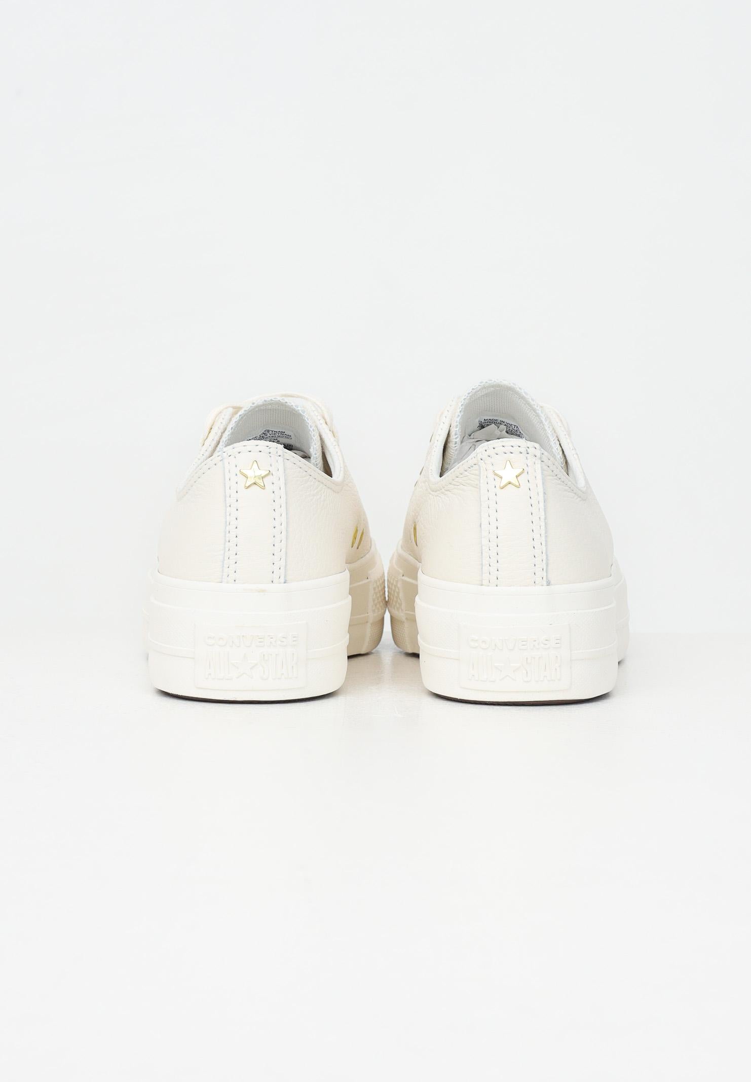 CONVERSE Sneakers CHUCK TAYLOR ALL STAR LIFT PLATFORM GOLD panna da donna A12765C . CONVERSE