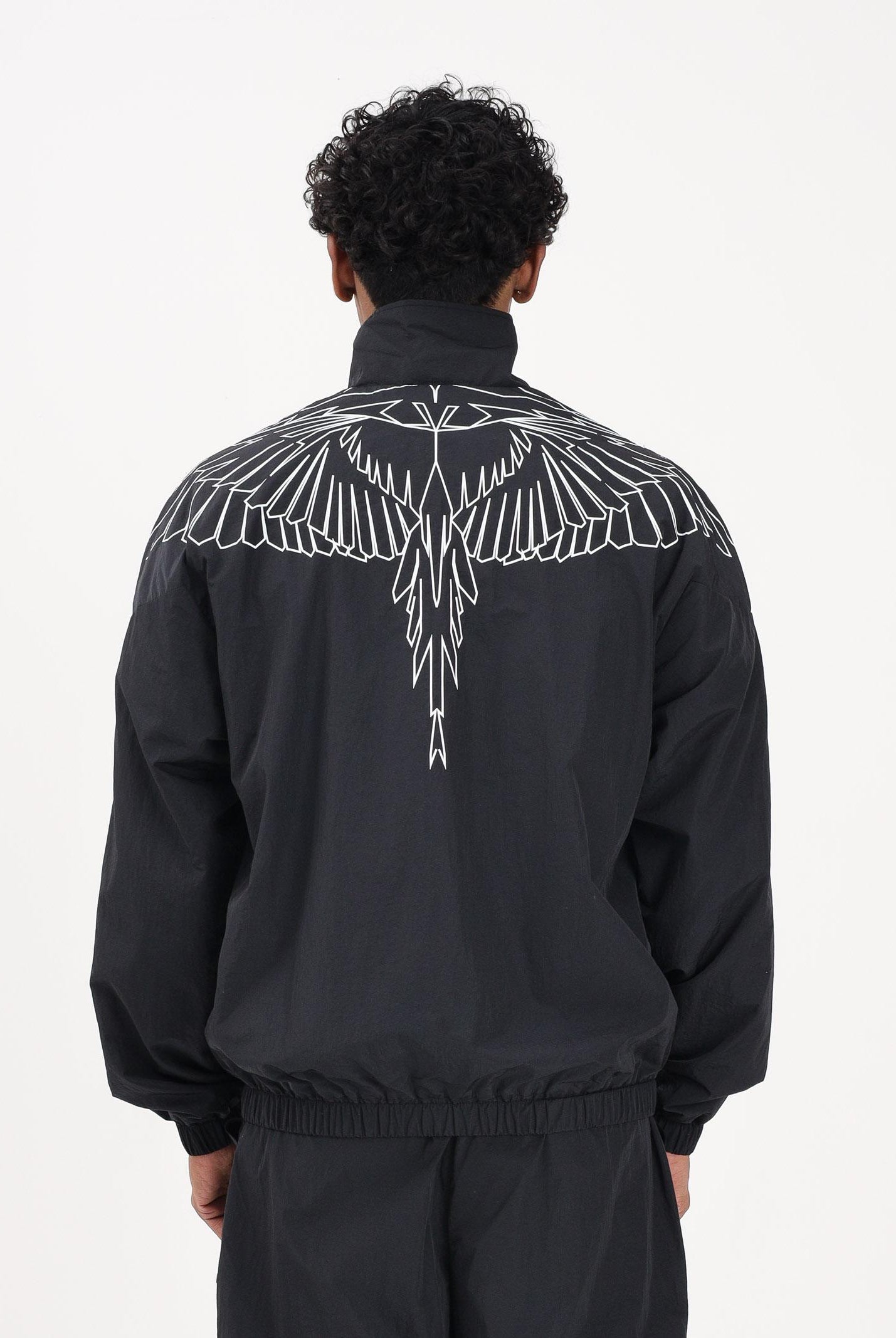 MARCELO BURLON COUNTY OF MILAN Giacca a vento nera da uomo con grafica ali S6CMMAJK075 110 MARCELO BURLON COUNTY OF MILAN