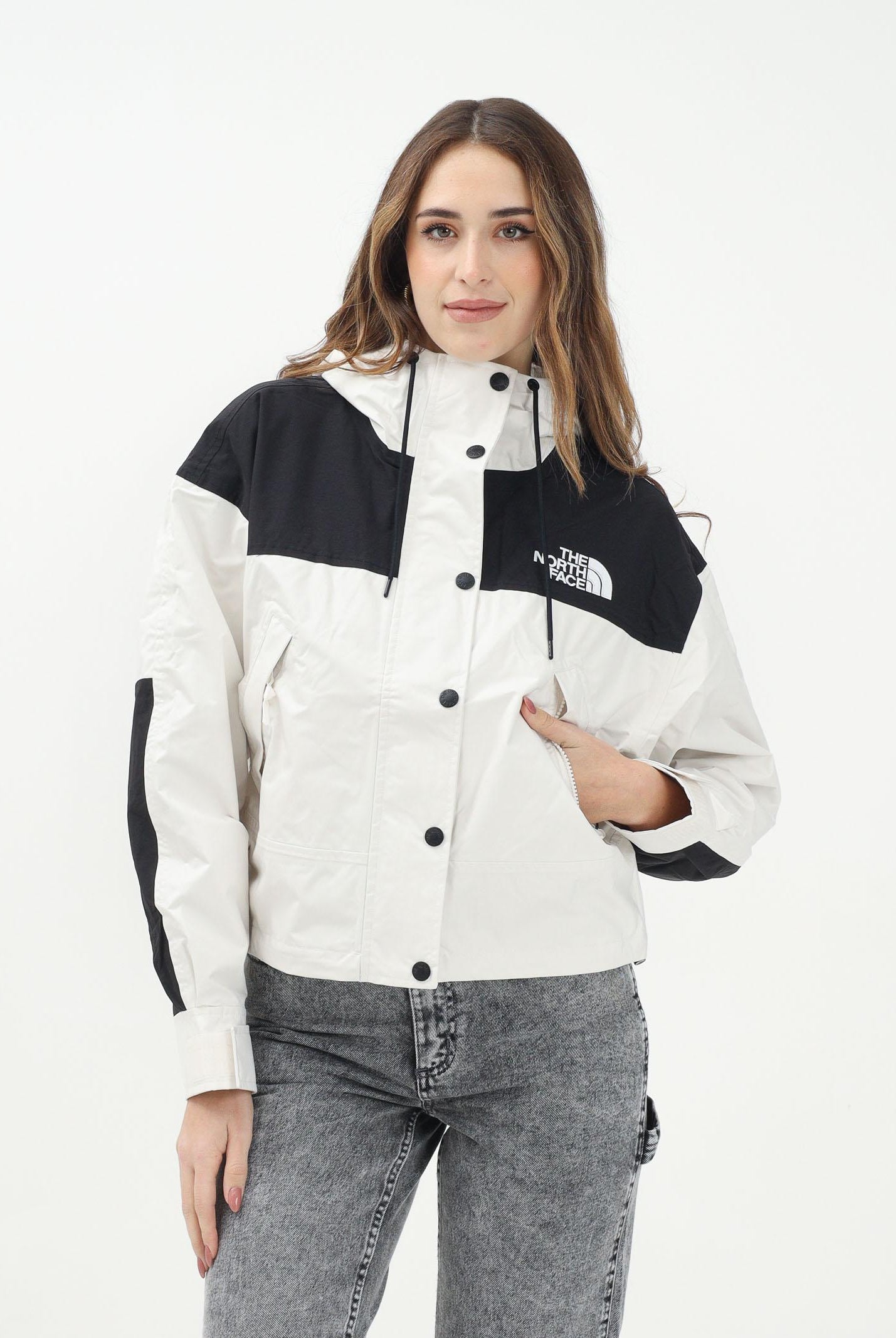 THE NORTH FACE Giacca a vento Mountain Mono nera e panna da donna NF0A8BCHROU1 . THE NORTH FACE