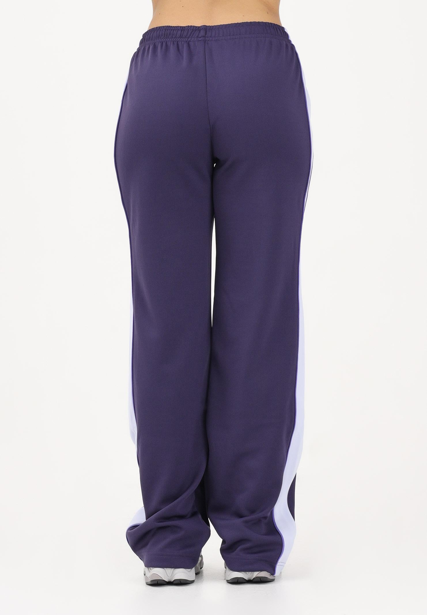 NEW BALANCE Pantalone sportivo Interlock viola da donna WB61Q2R4BOY . NEW BALANCE