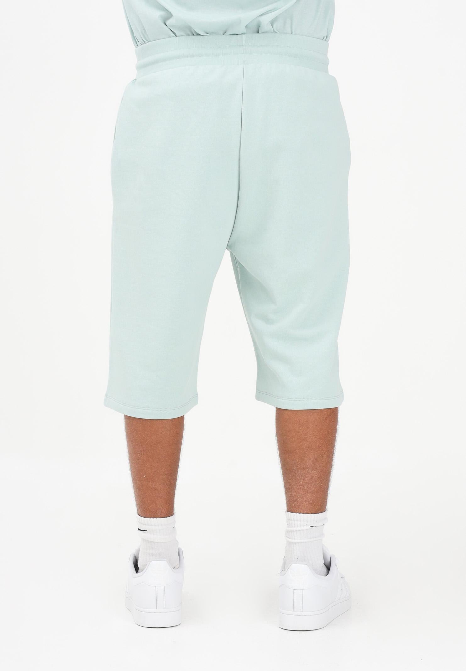 GCDS Shorts sportivo verde acqua per uomo e donna con stampa logo C1MEQL216F004 818G GCDS