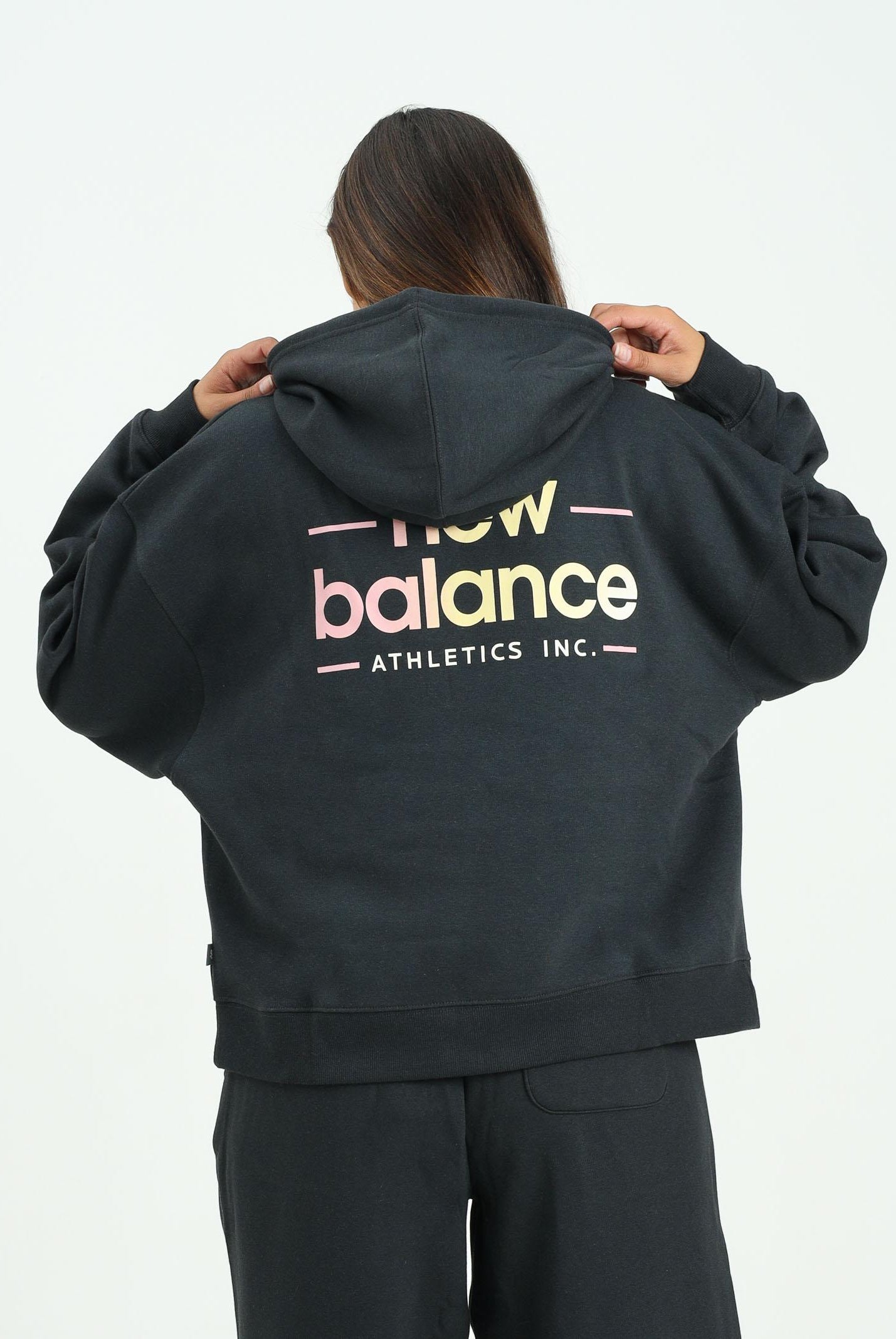 NEW BALANCE Felpa con zip Reimagined Fleece Oversized nera da donna WT53515BK . NEW BALANCE
