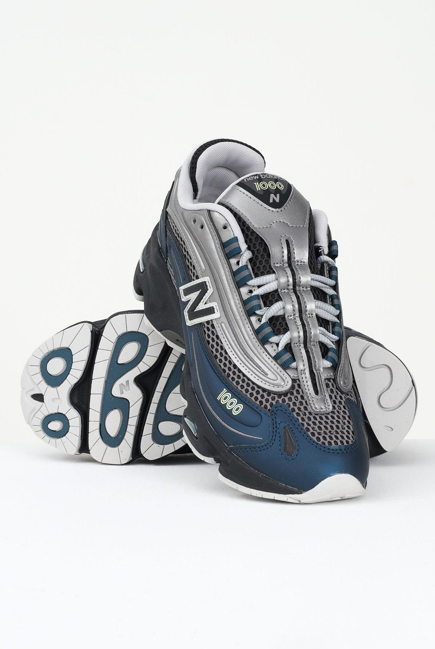 NEW BALANCE Sneakers 1000 ottanio e argento per uomo e donna M1000S . NEW BALANCE