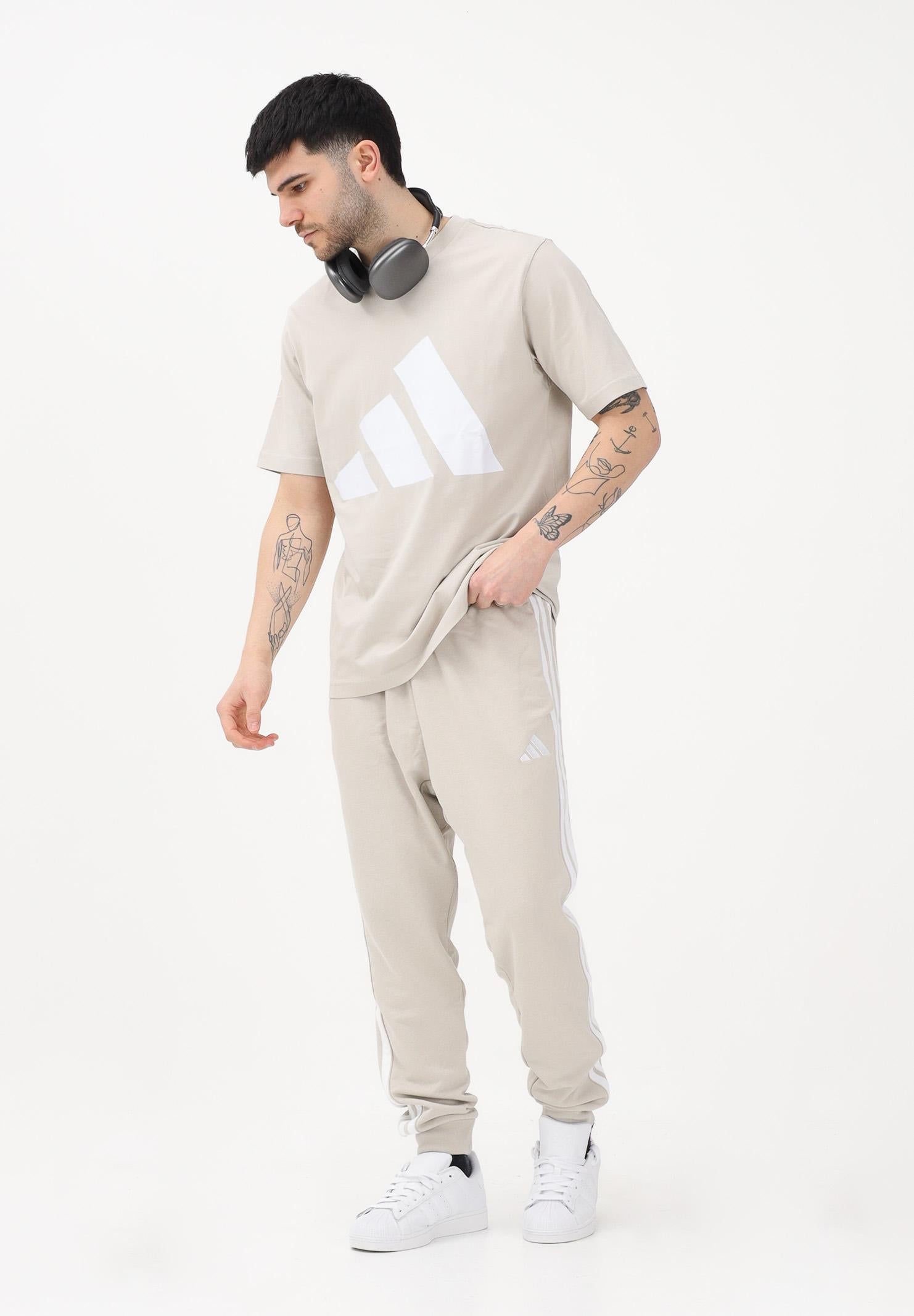 ADIDAS PERFORMANCE Pantalone sportivo ESSENTIALS THREE STRIPES FRENCH TERRY beige da uomo JE6353 . ADIDAS PERFORMANCE