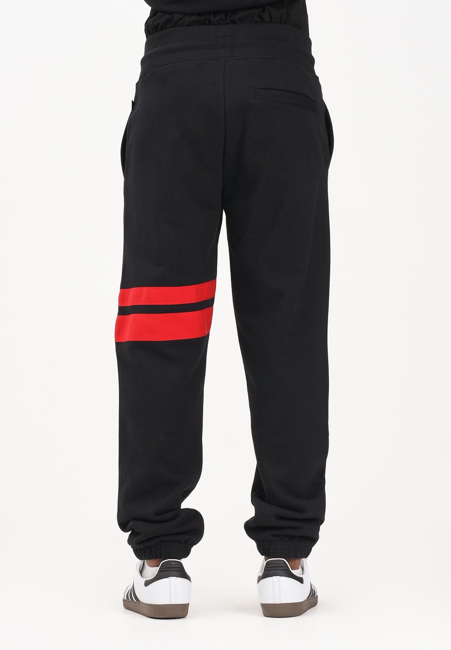 GCDS Pantalone sportivo nero per uomo e donna con dettagli a contrasto B1XM3002JI0 99 GCDS