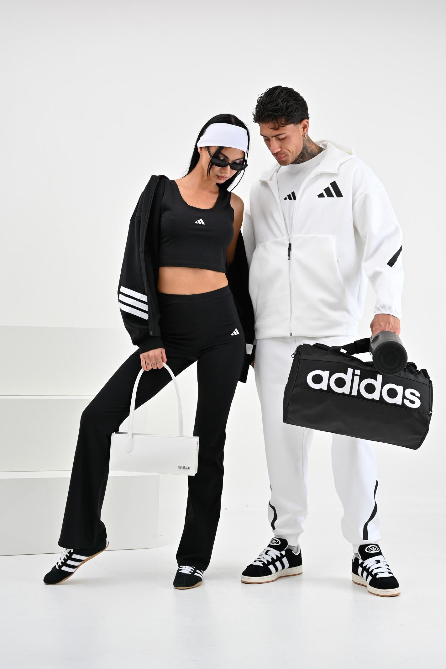 Borsone Essentials Linear Medium nera per uomo e donna HT4743 . ADIDAS PERFORMANCE