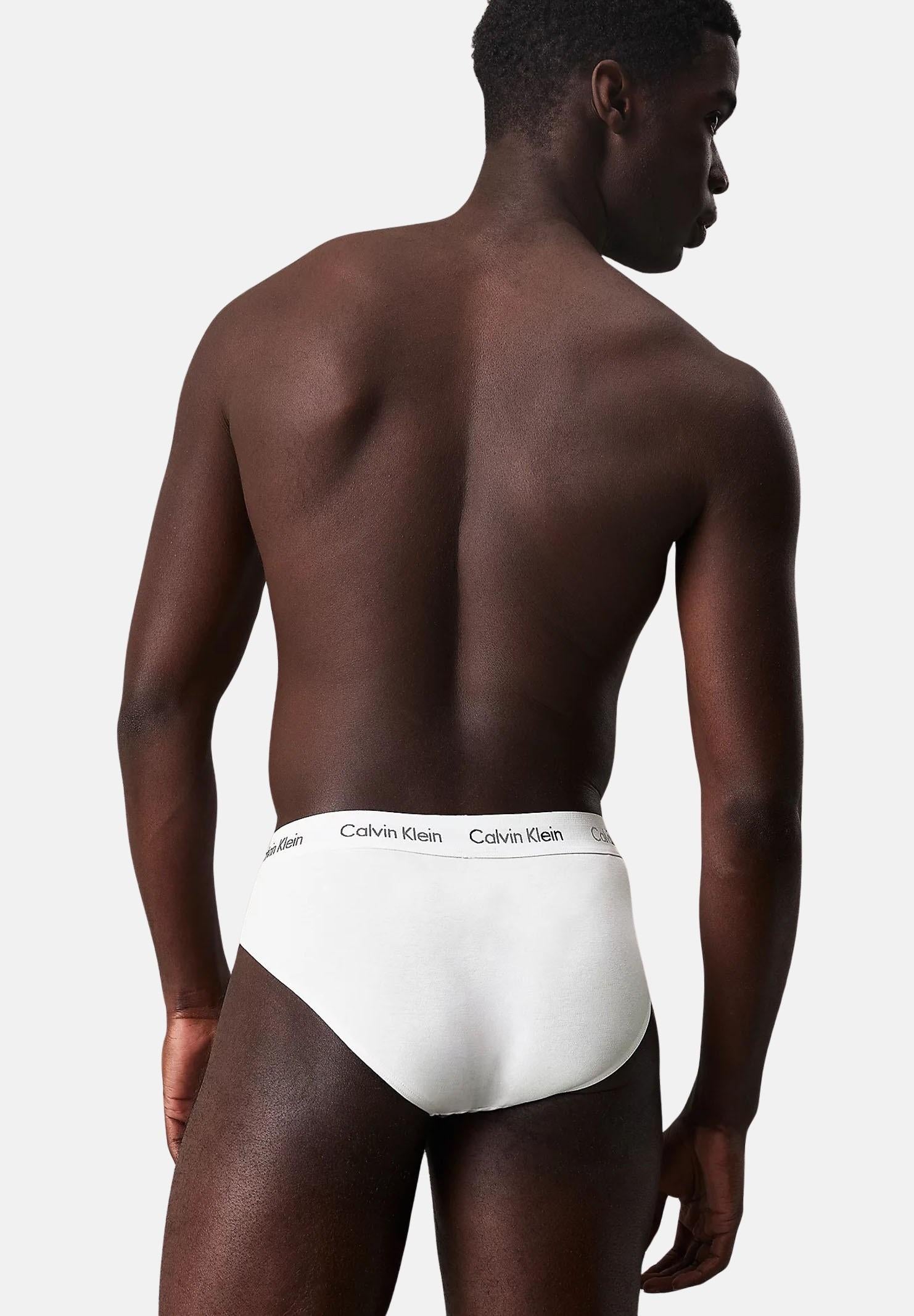 CALVIN KLEIN Set composto da tre slip bianchi da uomo con vita elastica logata 000NB3962A 100 CALVIN KLEIN
