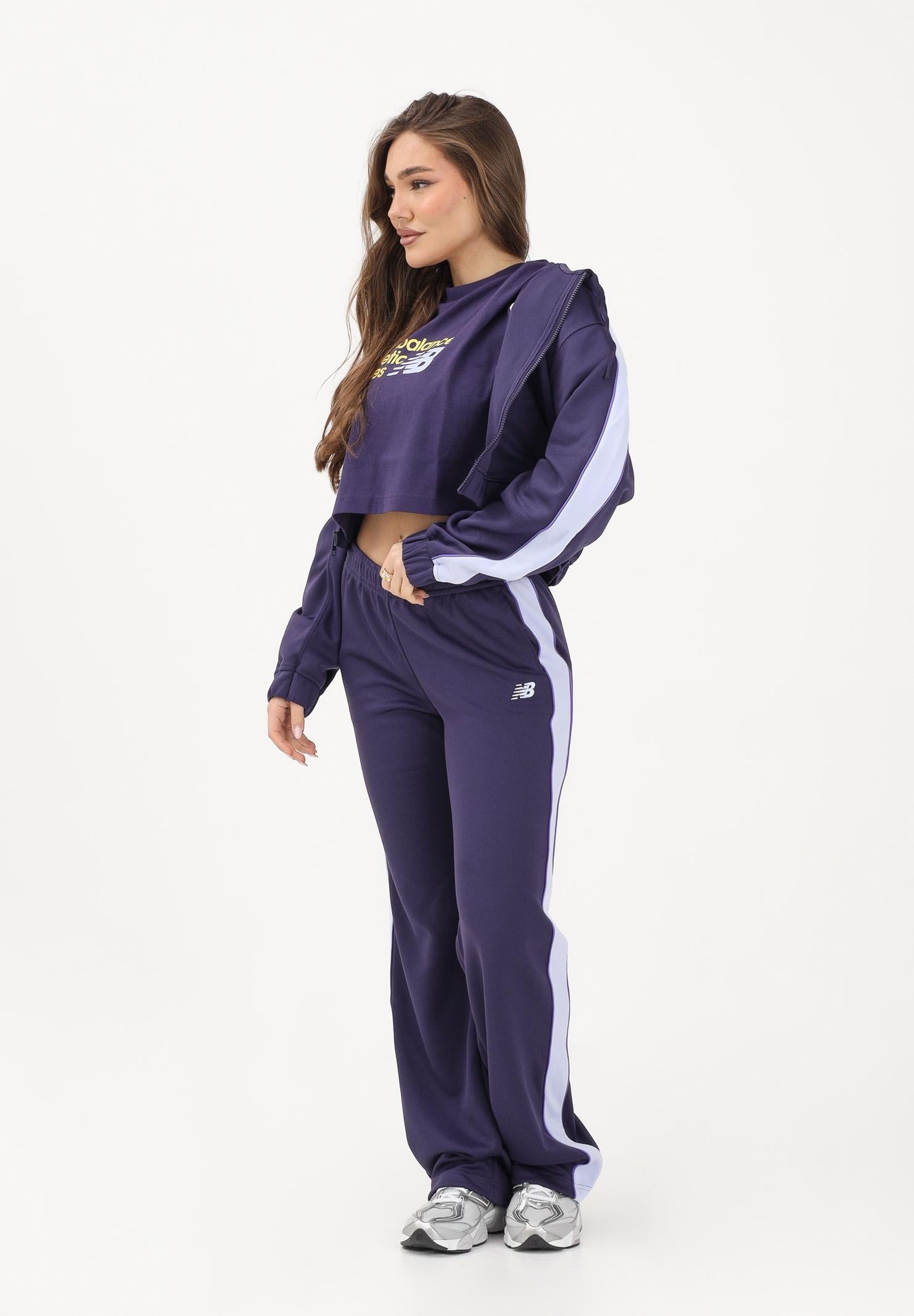 NEW BALANCE Pantalone sportivo Interlock viola da donna WB61Q2R4BOY . NEW BALANCE