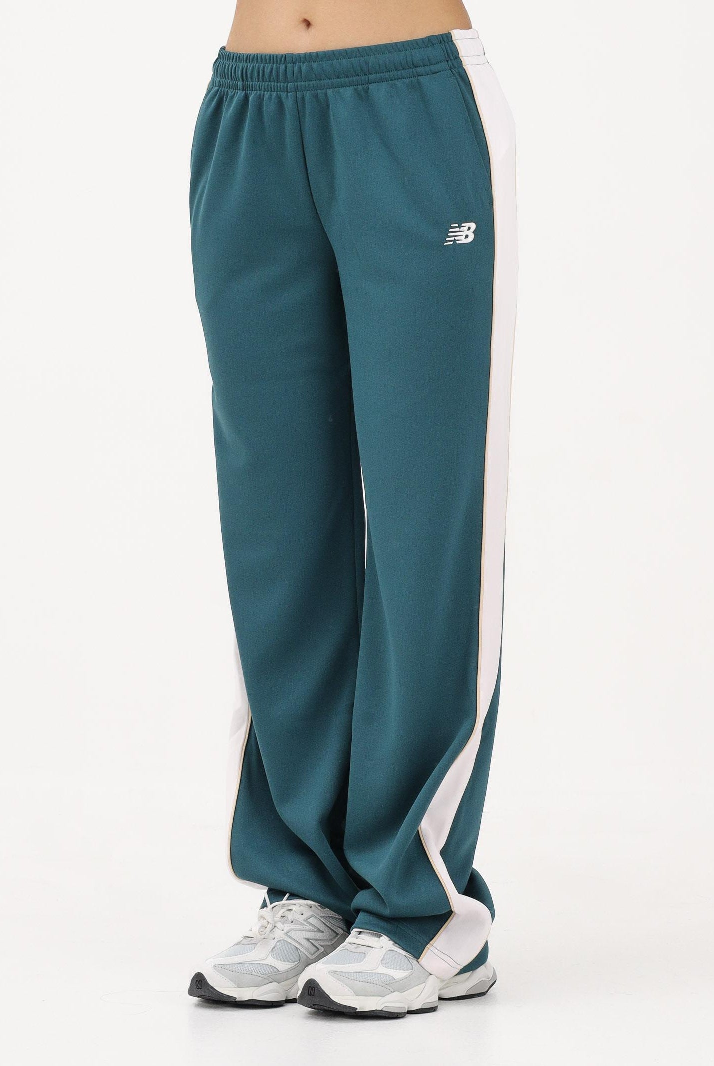 NEW BALANCE Pantalone sportivo Interlock verde da donna WB61Q2R4AAV . NEW BALANCE