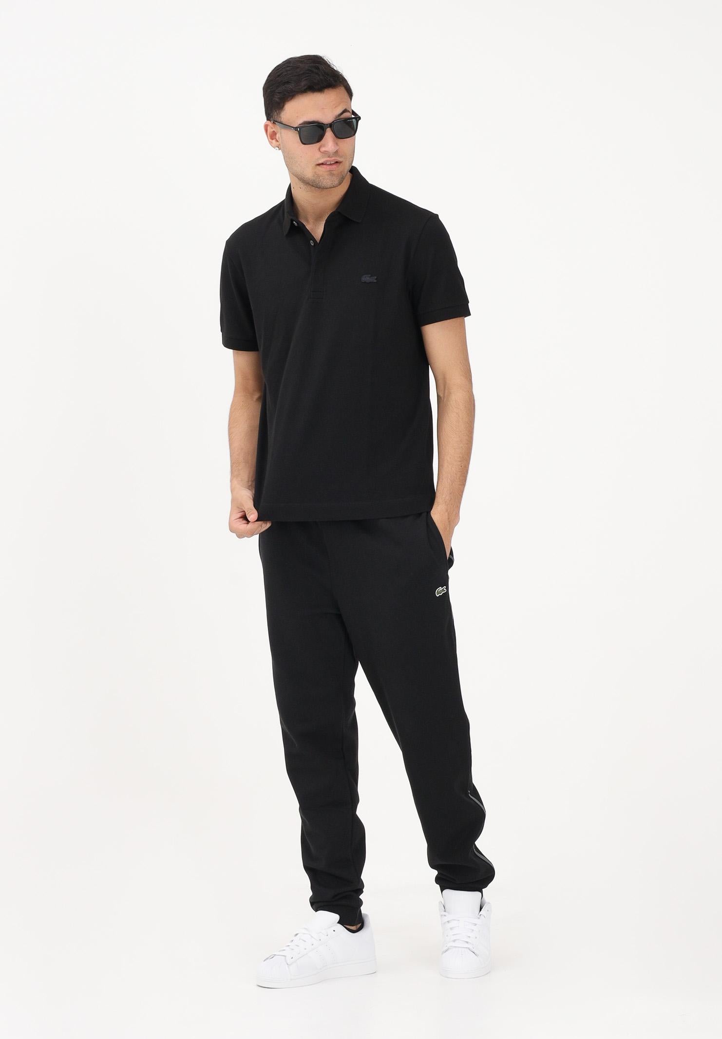 LACOSTE Pantalone sportivo nero da uomo con rifiniture laterali logate XH0883 031 LACOSTE