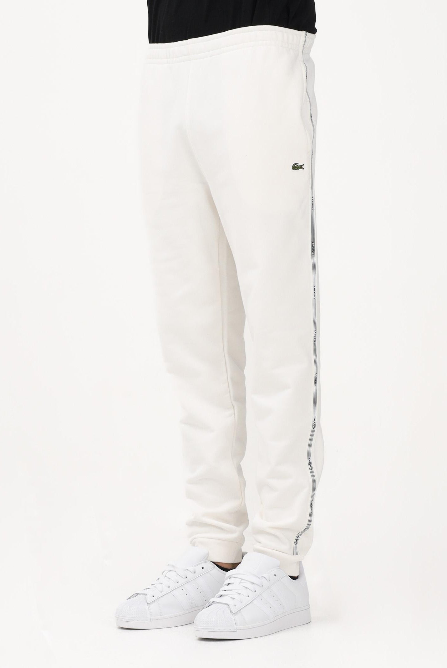 LACOSTE Pantalone sportivo bianco da uomo con rifiniture laterali logate XH0883 70V LACOSTE