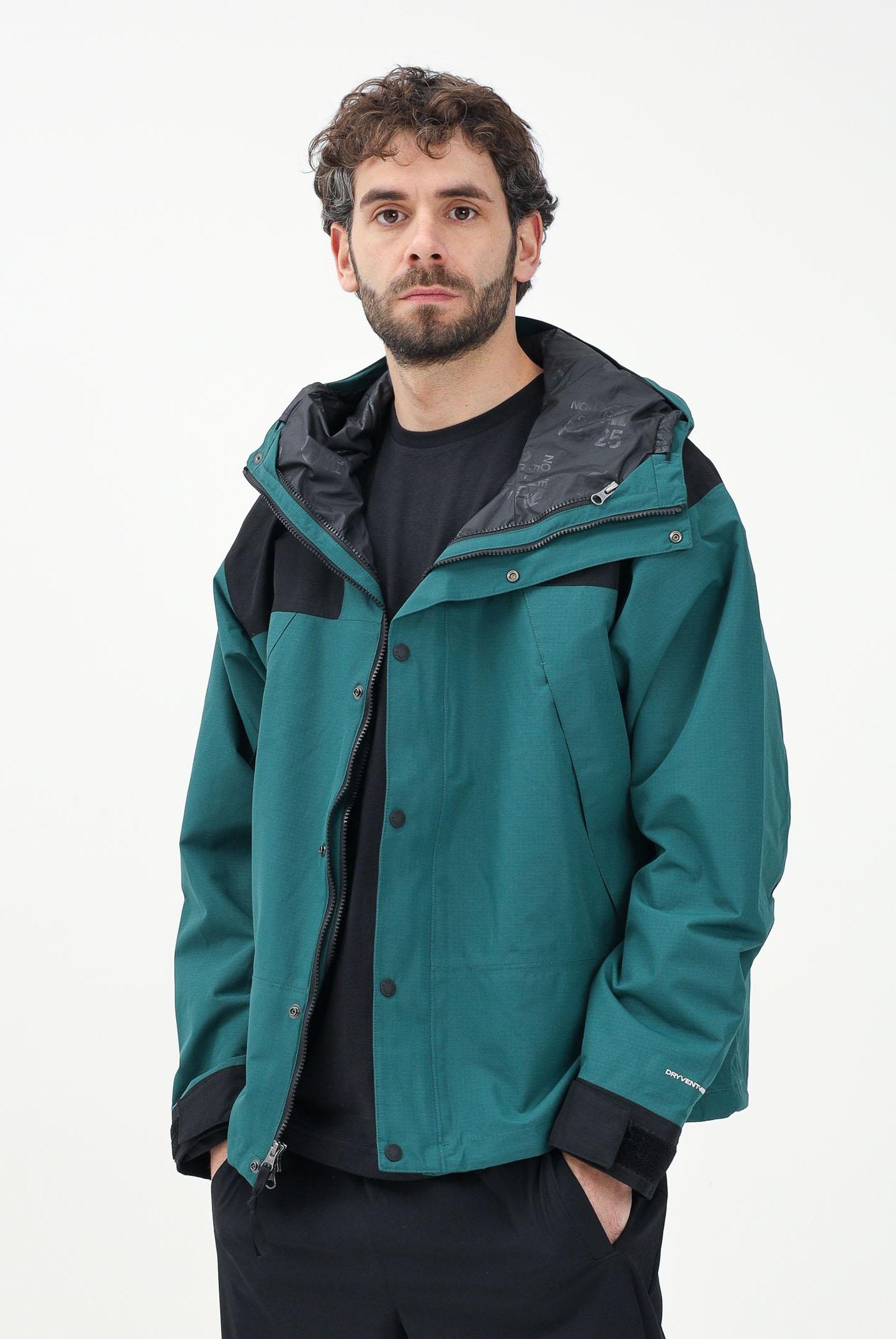 THE NORTH FACE Giacca a vento Mountain Mono verde da uomo NF0A88XF5861 . THE NORTH FACE