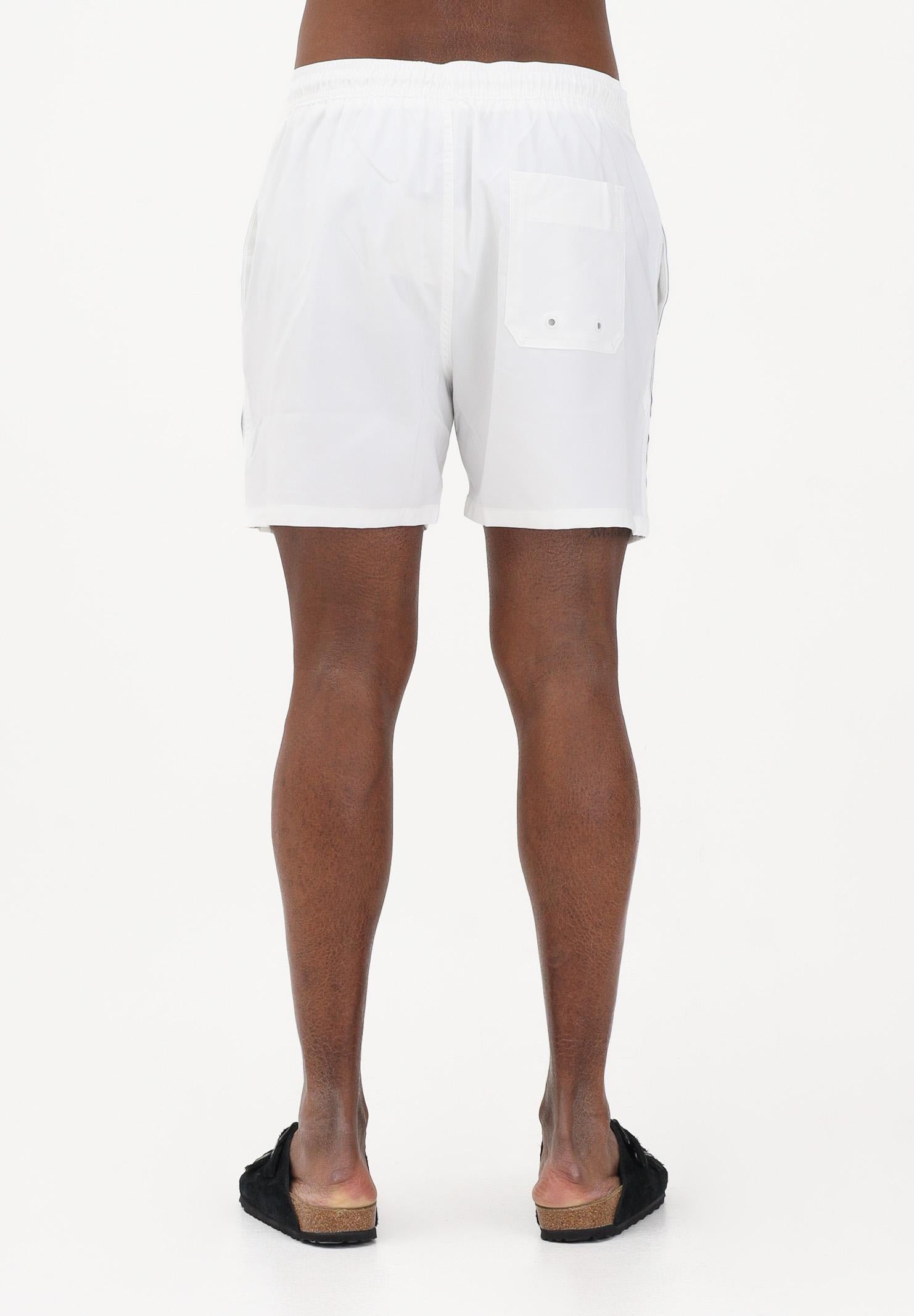 CALVIN KLEIN Shorts mare bianco da uomo arricchito da banda laterale con logo LV00N61002 100 CALVIN KLEIN