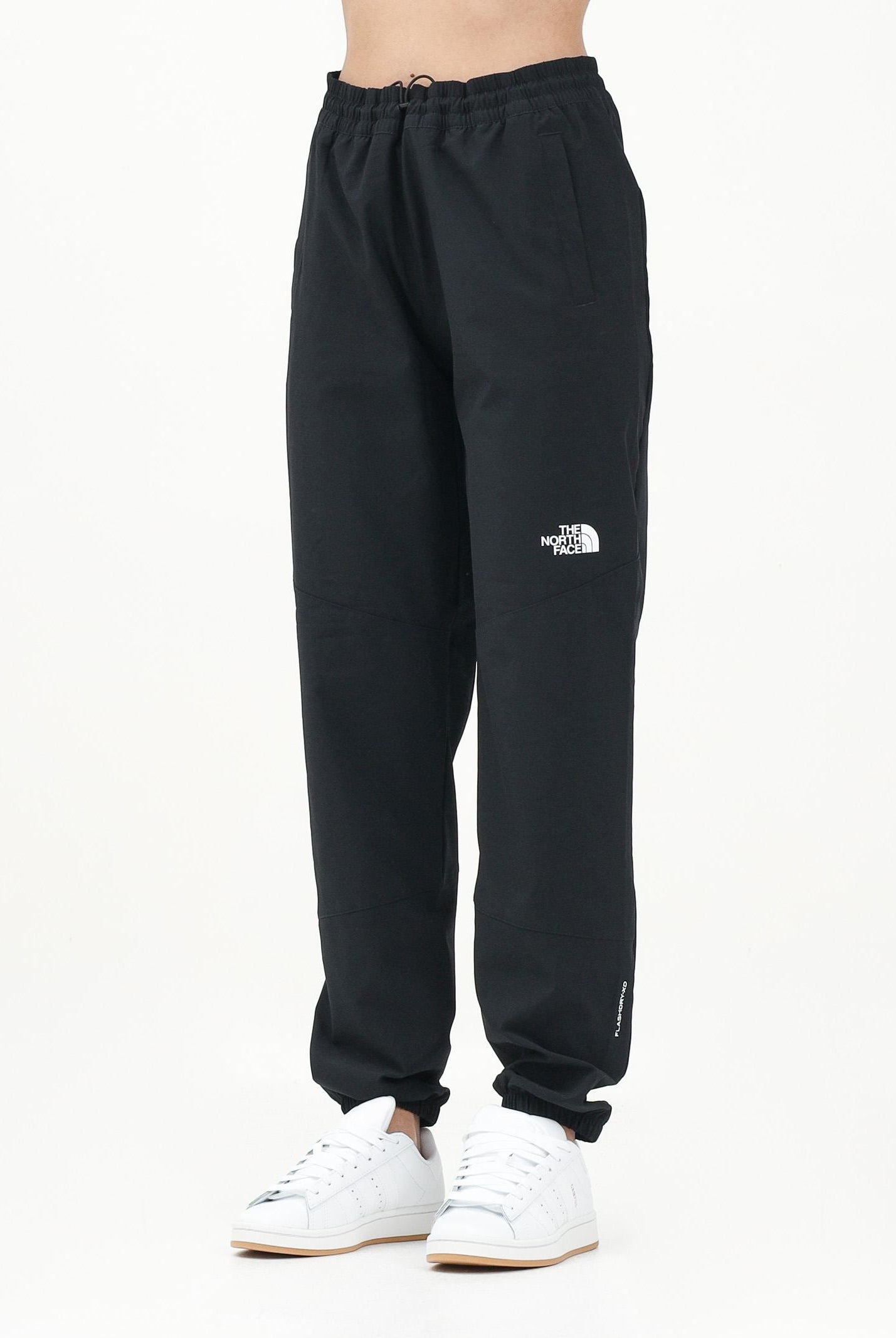 THE NORTH FACE Pantalone antivento Mountain Athletics nero da donna NF0A8BGPJK31 THE NORTH FACE