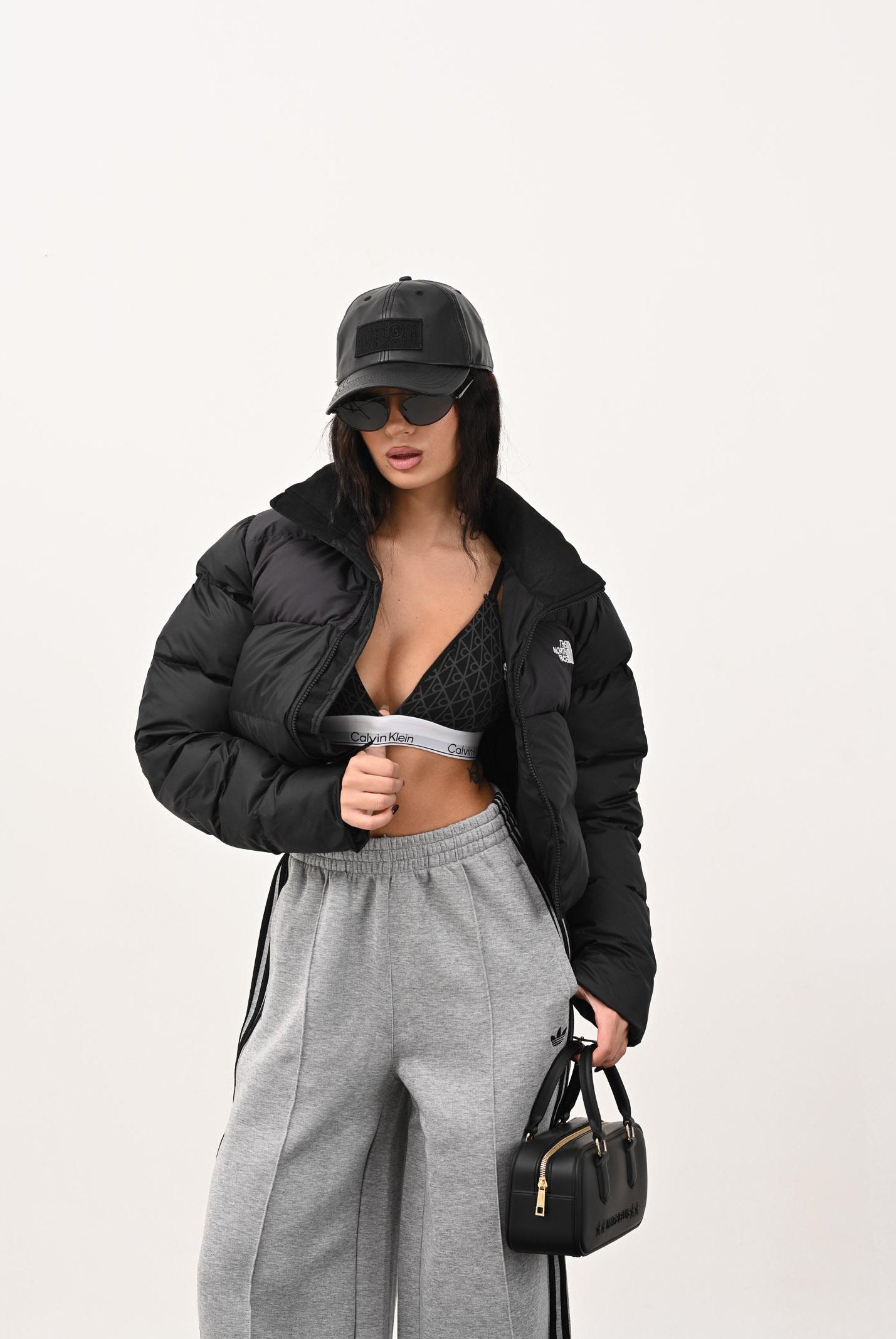 THE NORTH FACE Piumino Cropped Saikuru nero da donna NF0A89JCKT01 . THE NORTH FACE