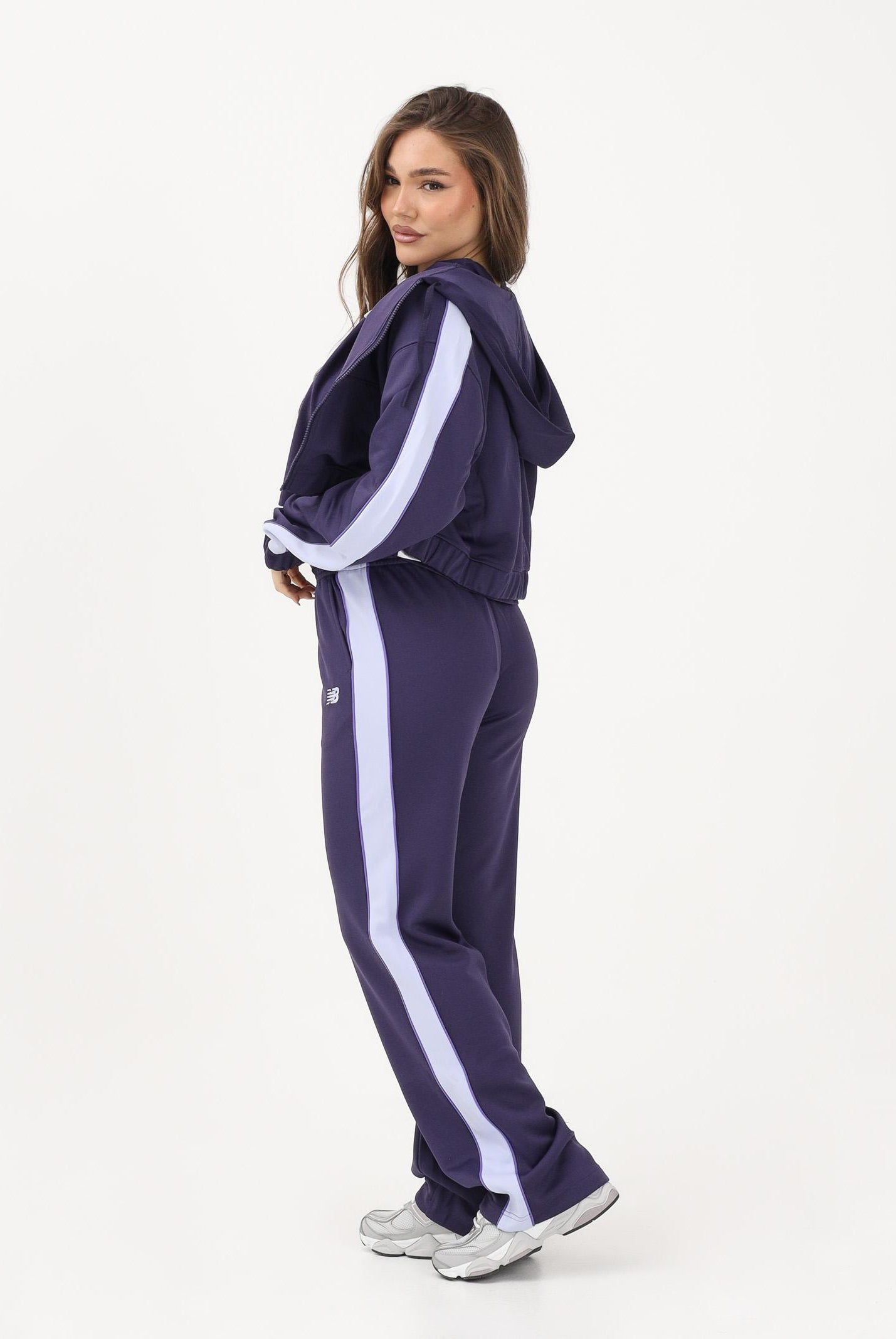 NEW BALANCE Pantalone sportivo Interlock viola da donna WB61Q2R4BOY . NEW BALANCE