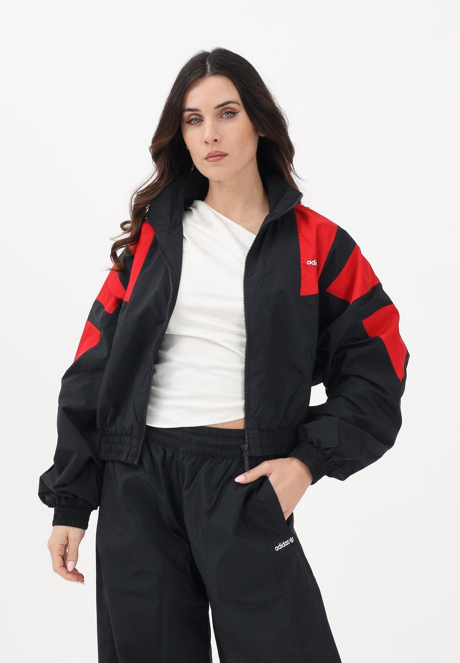 ADIDAS ORIGINALS Giacca a vento BLOCKED WASHED nera e rossa da donna KE5036 . ADIDAS ORIGINALS