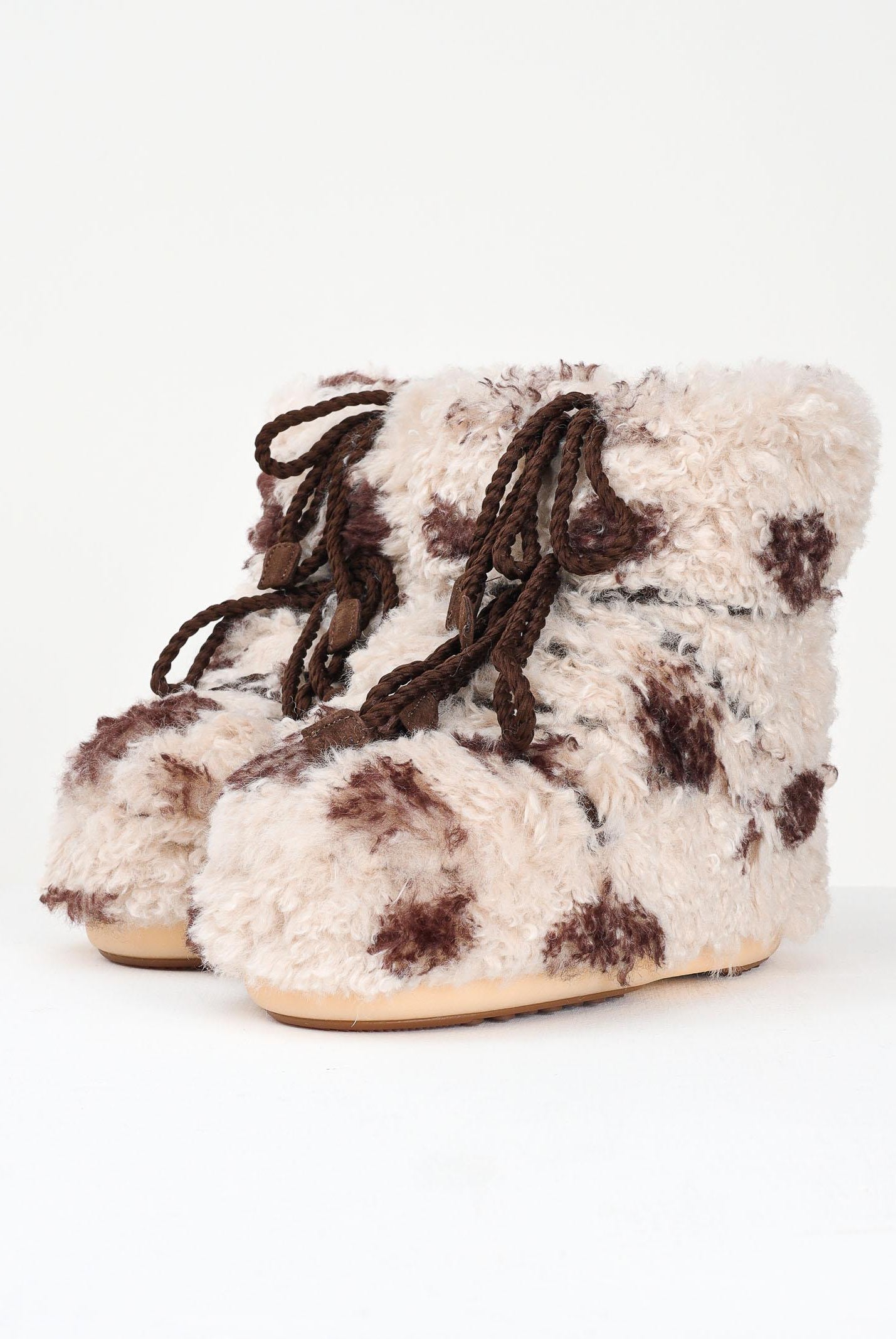 MOON BOOT Stivali da neve ICON LOW CURLY beige da donna con stampa cow 80D1409690 MM04 MOON BOOT