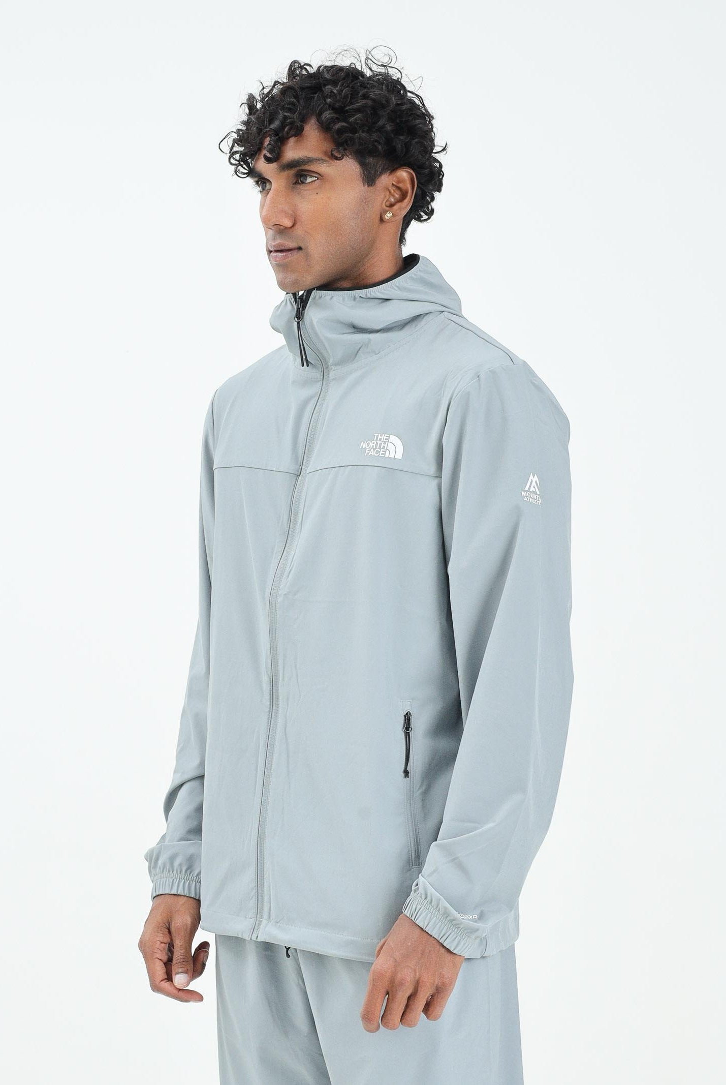 THE NORTH FACE Giacca a vento Mountain Athletics grigia da uomo NF0A8BP1H5F1 . THE NORTH FACE