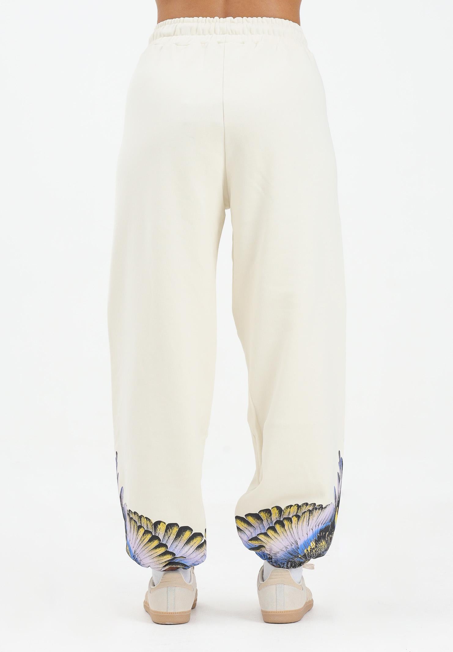 MARCELO BURLON COUNTY OF MILAN Pantalone sportivo panna da donna con stampa ali sul fondo 25ICM30074 LASK MARCELO BURLON COUNTY OF MILAN