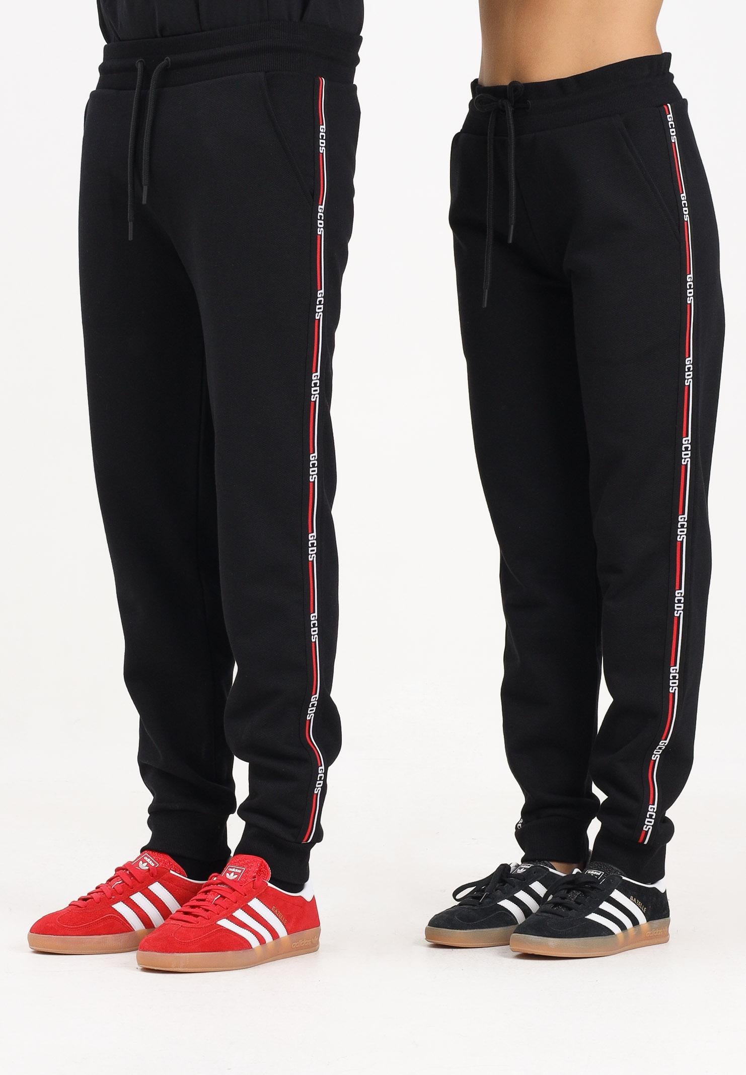 GCDS Pantalone sportivo nero per uomo e donna con banda logata B2EW3002JD1 99 GCDS