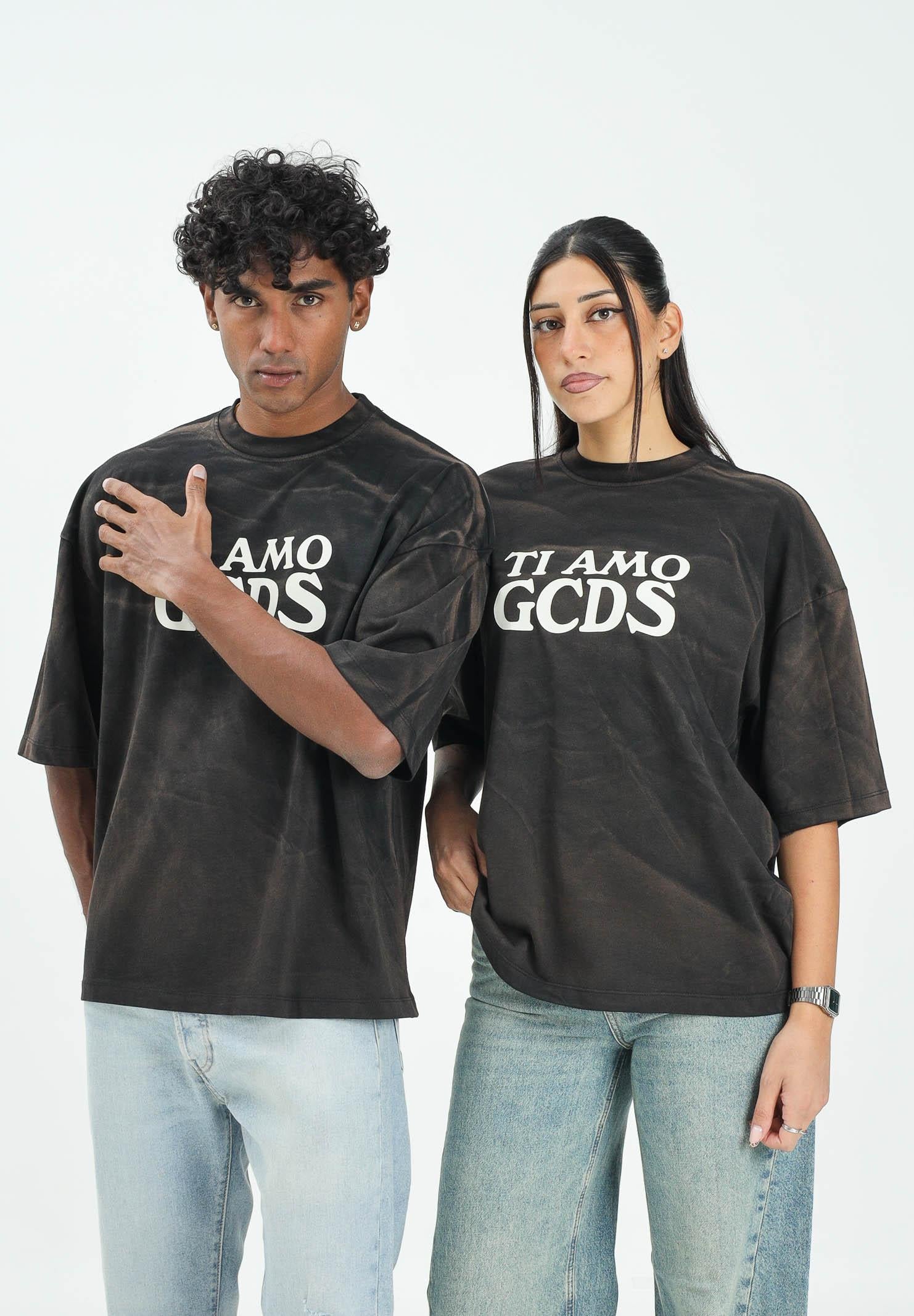 GCDS T-shirt a manica corta nera per uomo e donna con effetto lavato e stampa B2CM2315JF1 99 GCDS