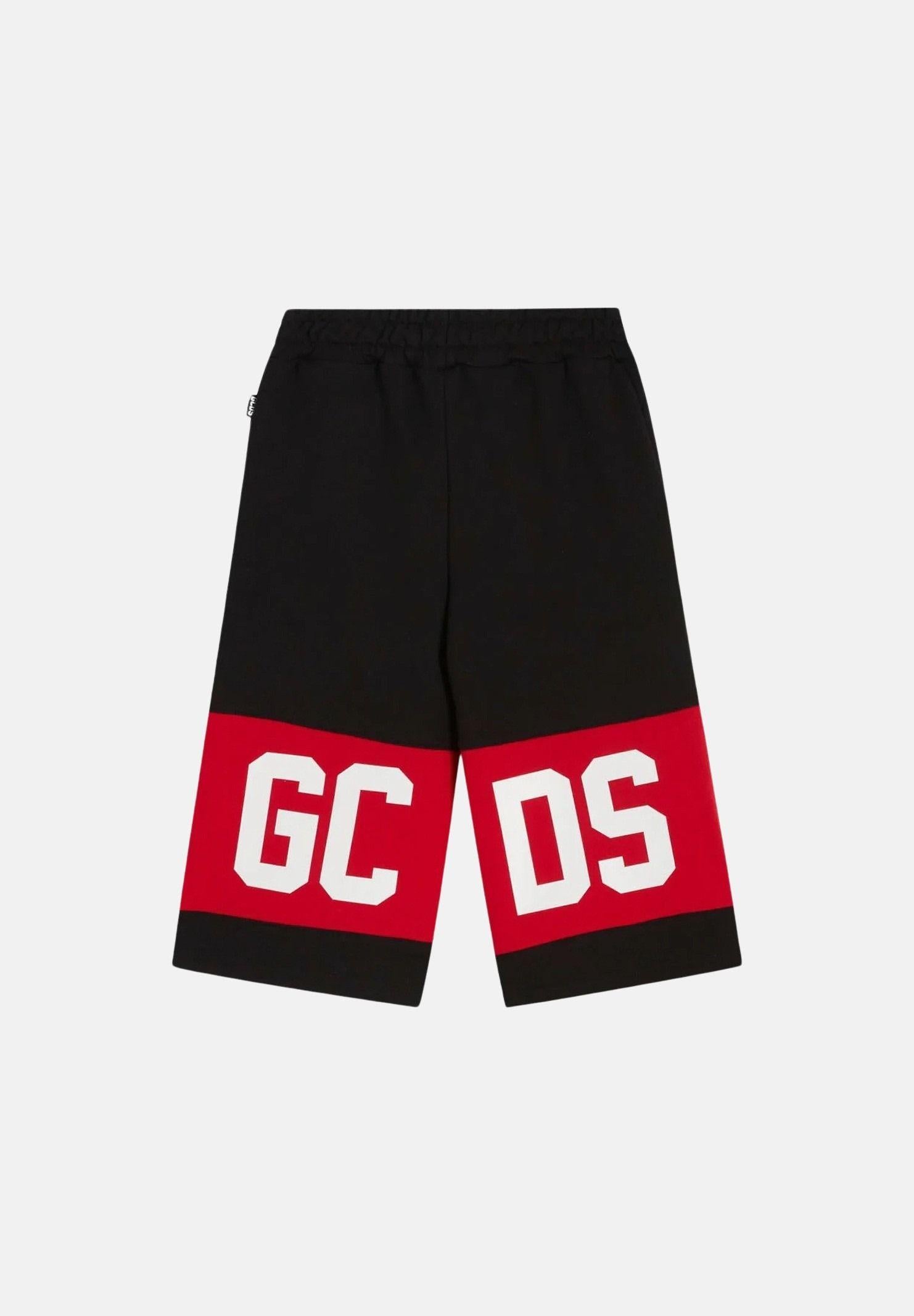 GCDS Shorts nero per bambino e bambina con banda rossa e logo Z0UKQL589F004 999R GCDS