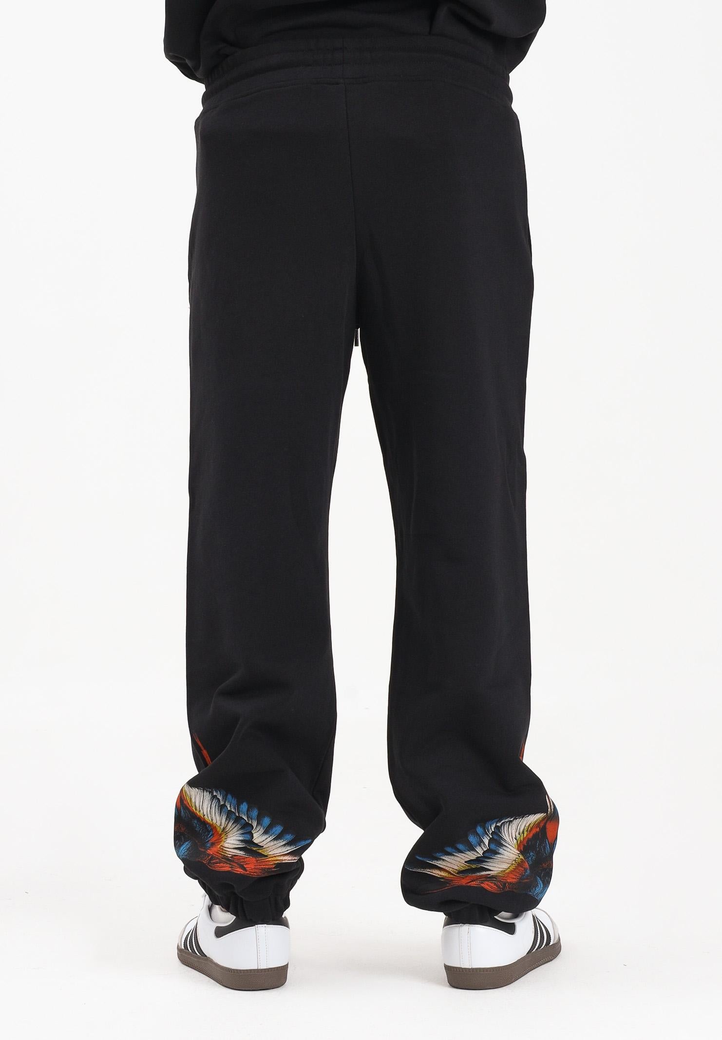 MARCELO BURLON COUNTY OF MILAN Pantalone sportivo nero da uomo con stampa ali F5CAMAFP026 110 MARCELO BURLON COUNTY OF MILAN