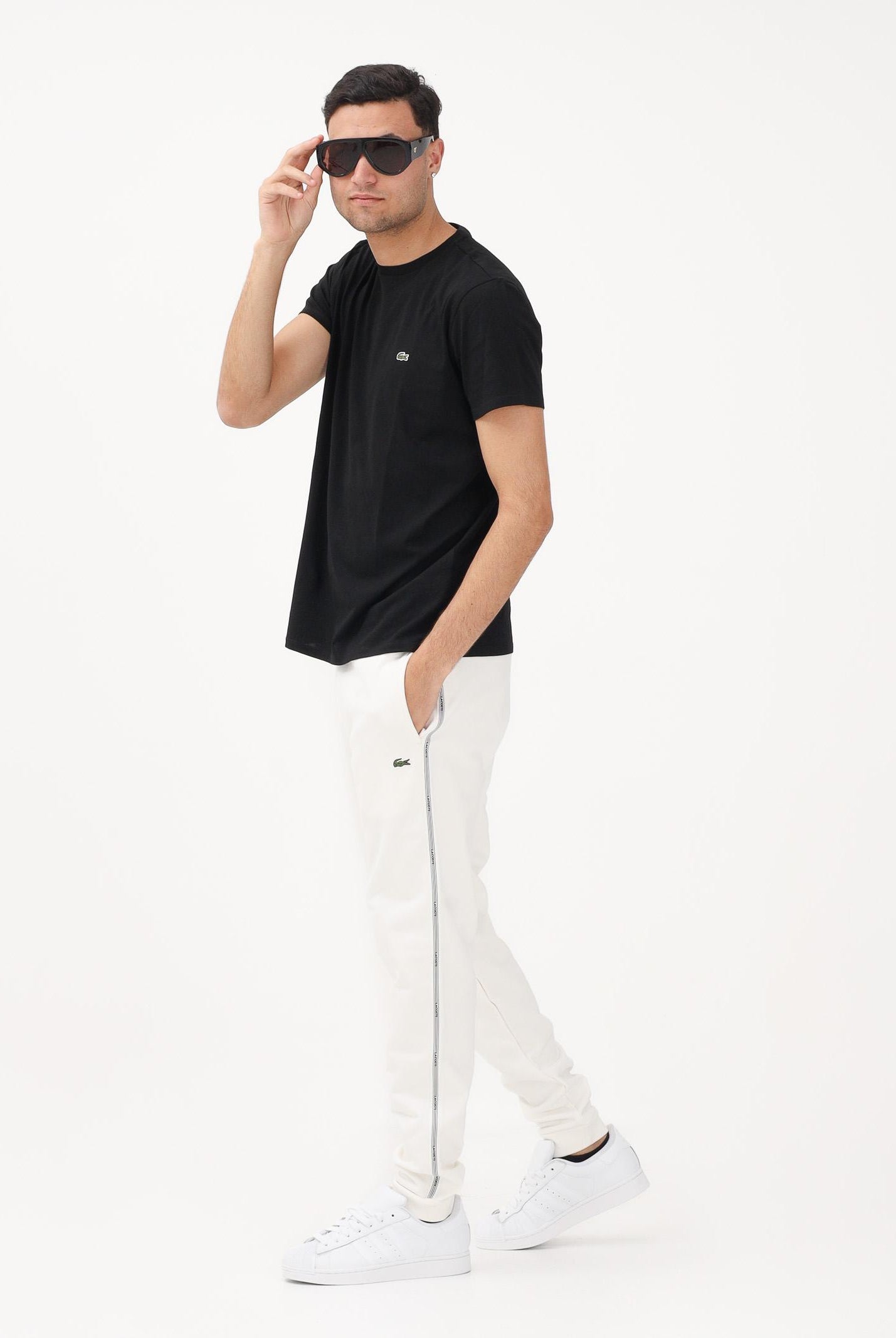 LACOSTE Pantalone sportivo bianco da uomo con rifiniture laterali logate XH0883 70V LACOSTE