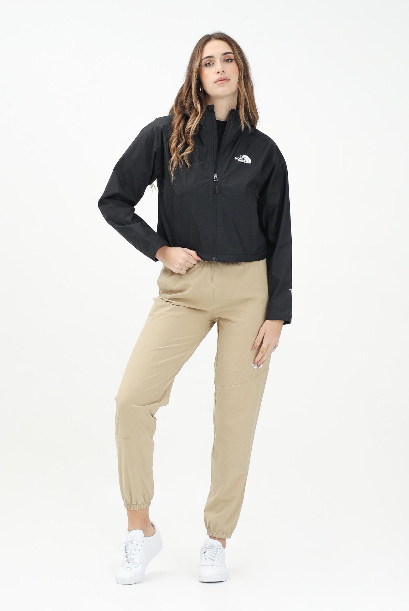 THE NORTH FACE Pantalone antivento Mountain Athletics beige da donna NF0A8BGPLK51 . THE NORTH FACE