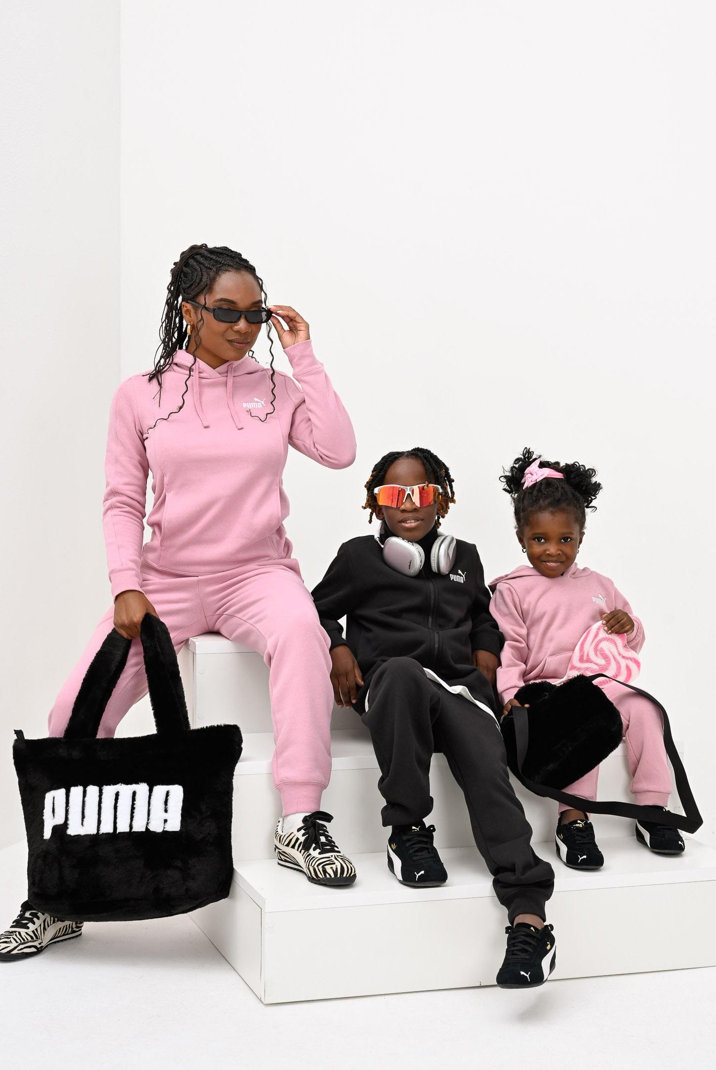 PUMA Tuta Essential nera per bambino e bambina 691934 01 PUMA