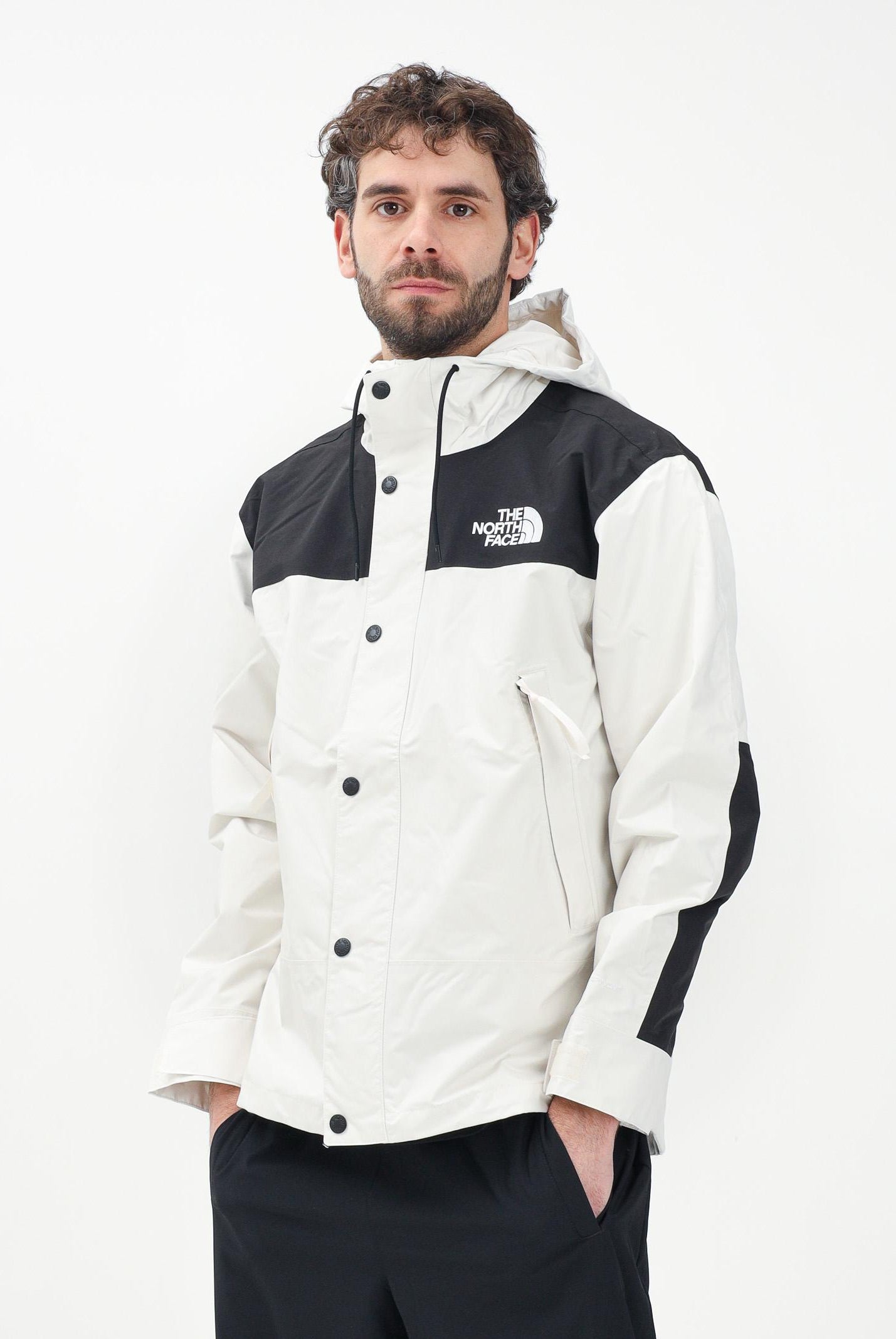 THE NORTH FACE Giacca a vento Reign On bianca e nera da uomo NF0A8B5GROU1 . THE NORTH FACE