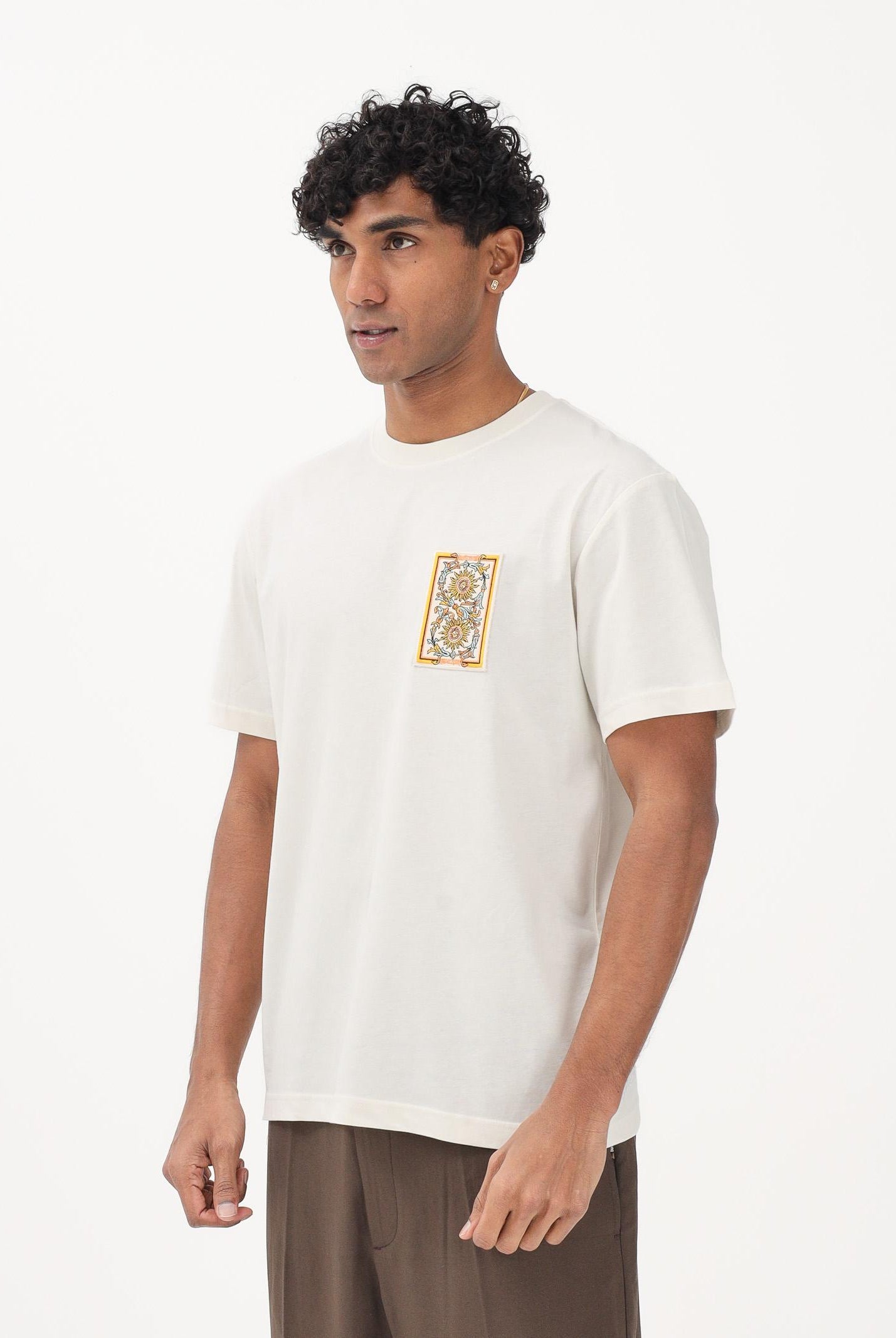 JUST CAVALLI T-shirt a manica corta bianca da uomo arricchita da applicazione grafica sul petto 80OAHT21CJ500 004 JUST CAVALLI