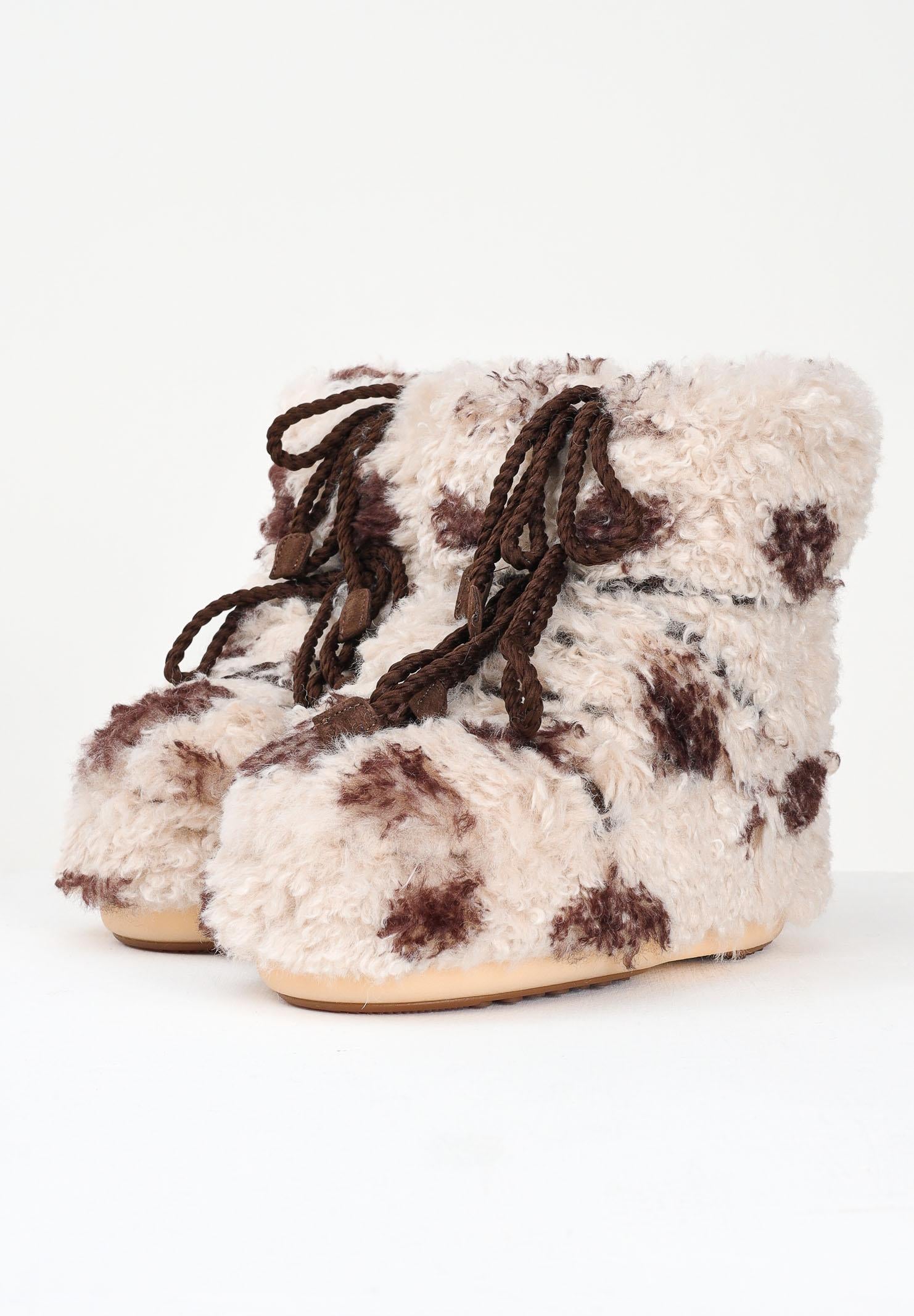 MOON BOOT Stivali da neve ICON LOW CURLY beige da donna con stampa cow 80D1409690 MM04 MOON BOOT