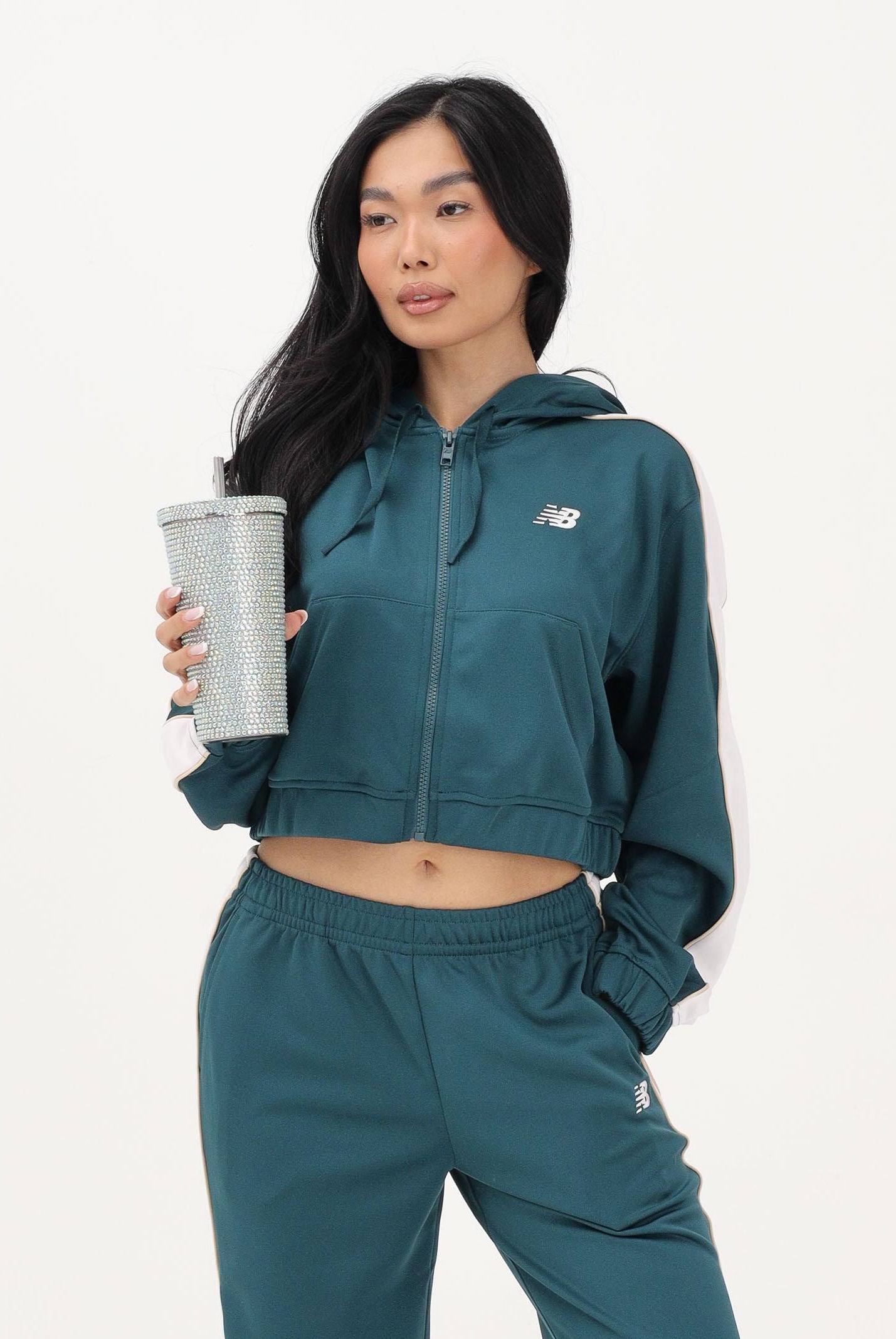 NEW BALANCE Felpa con zip Interlock verde da donna WJ61B759AAV . NEW BALANCE