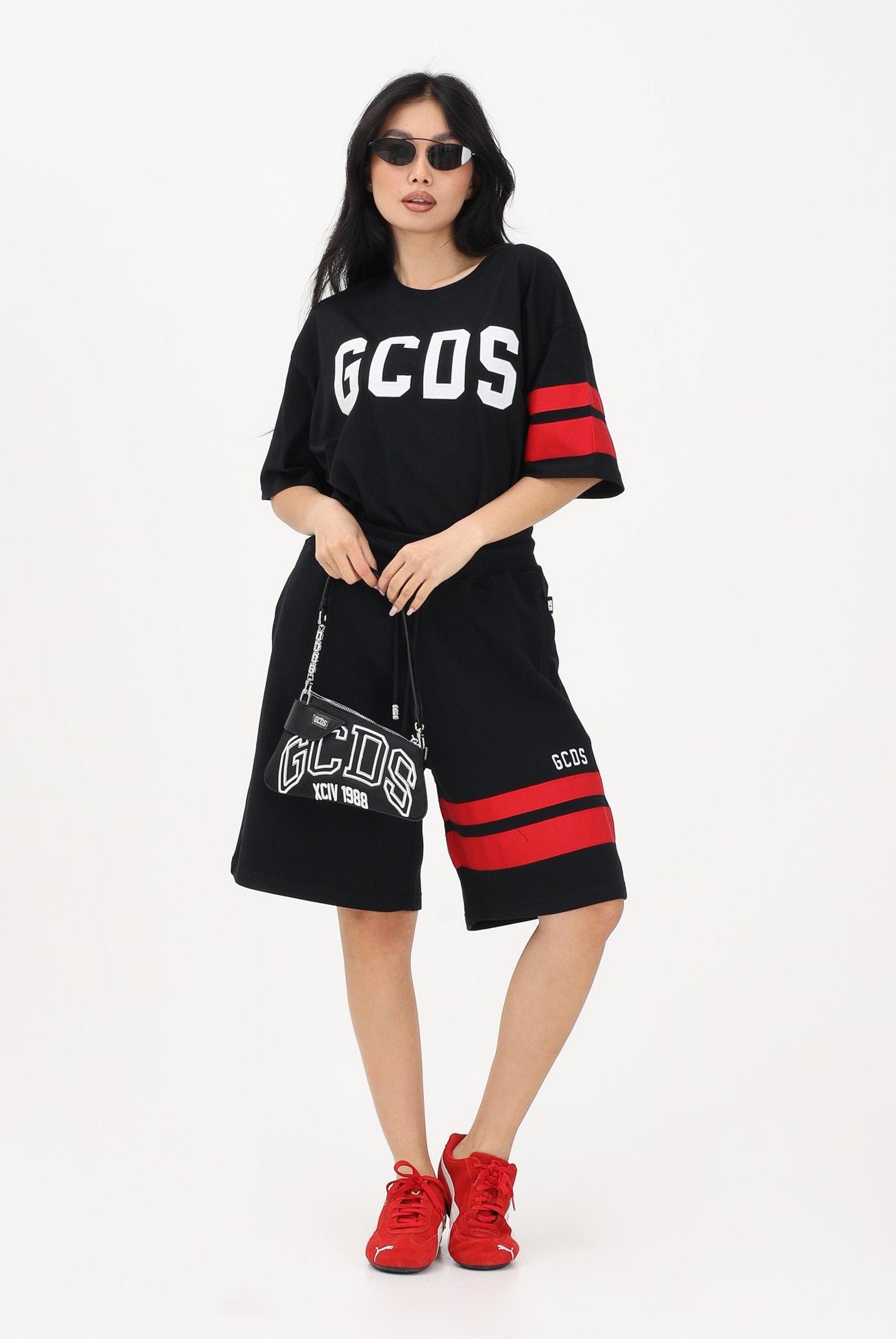 GCDS Shorts sportivo nero per uomo e donna con dettagli a contrasto Z0MLQL229F004 999R GCDS