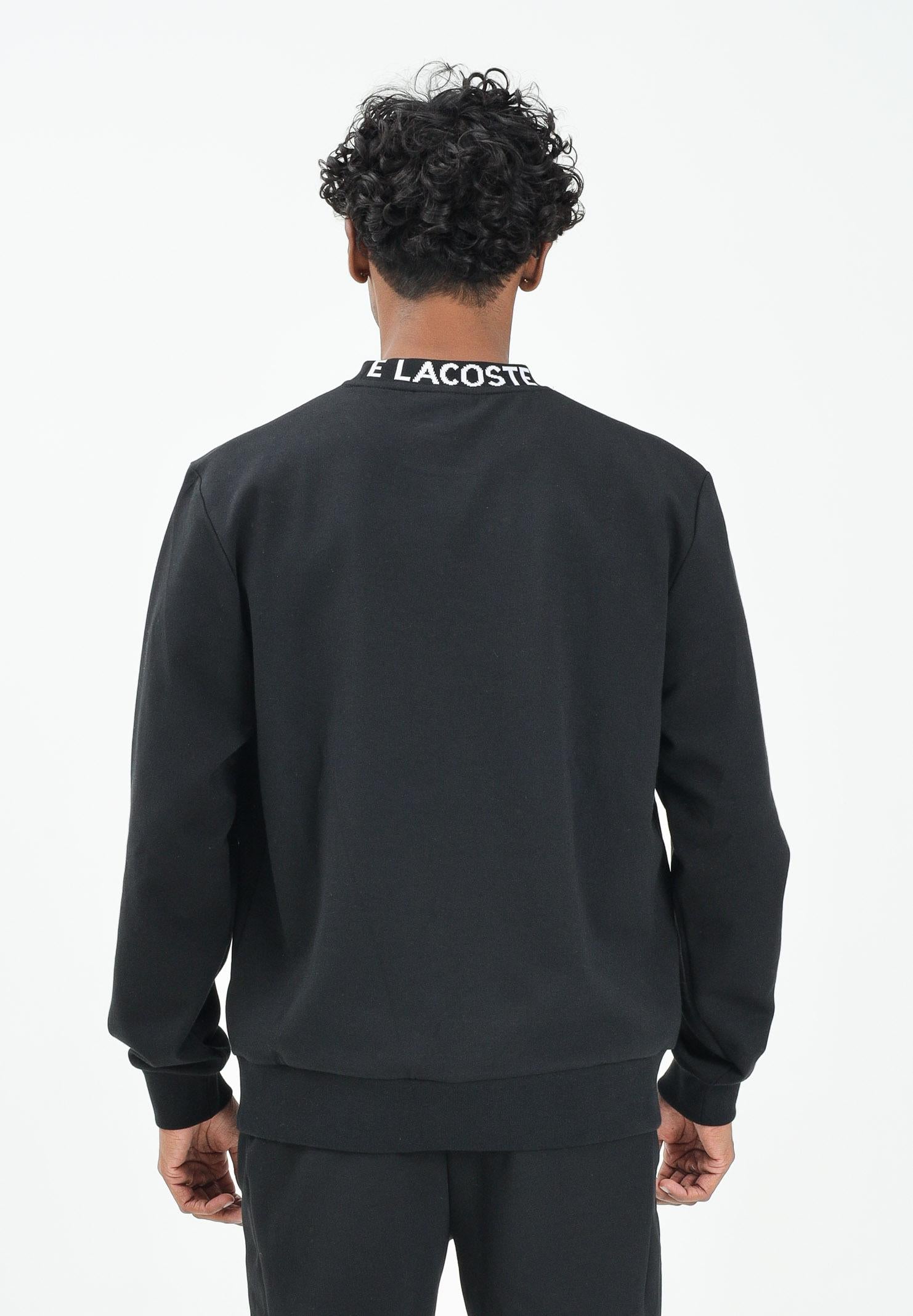 LACOSTE Felpa girocollo nera da uomo con marchio Jacquard SH9542 031 LACOSTE