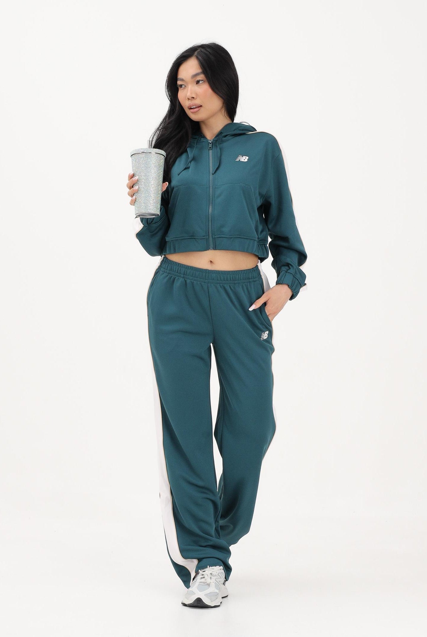 NEW BALANCE Pantalone sportivo Interlock verde da donna WB61Q2R4AAV . NEW BALANCE