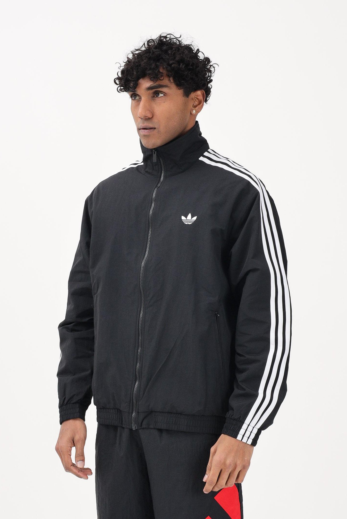 ADIDAS ORIGINALS Giacca a vento Firebird Woven nera da uomo KE1366 . ADIDAS ORIGINALS