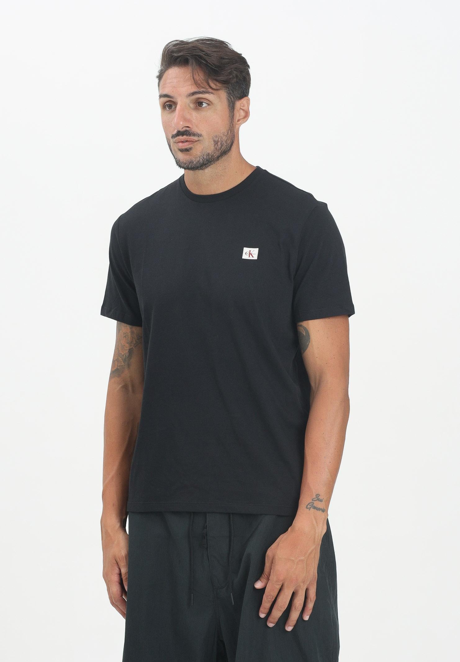 CALVIN KLEIN JEANS T-shirt a manica corta nera da uomo con stemma logo LV04RC272GUB1 . CALVIN KLEIN JEANS
