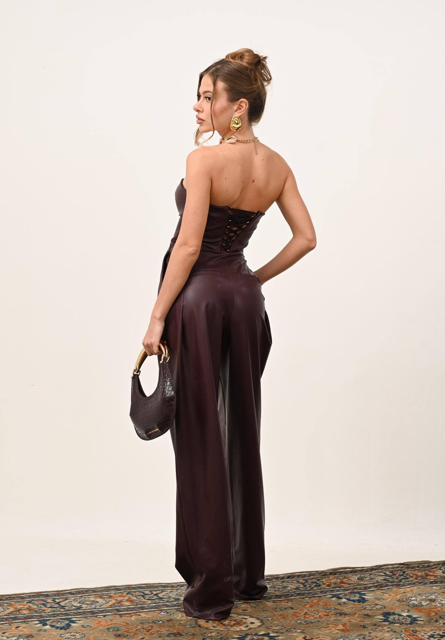 ELISABETTA FRANCHI Tuta bordeaux da donna realizzata in materiale sintetico effetto pelle TU06858E2 EA4 ELISABETTA FRANCHI