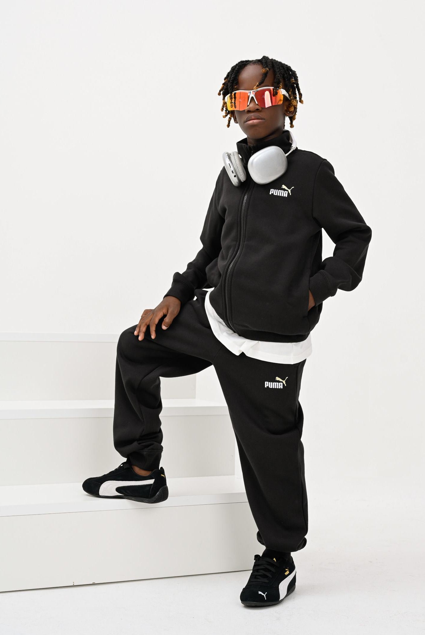 PUMA Tuta Essential nera per bambino e bambina 691934 01 PUMA