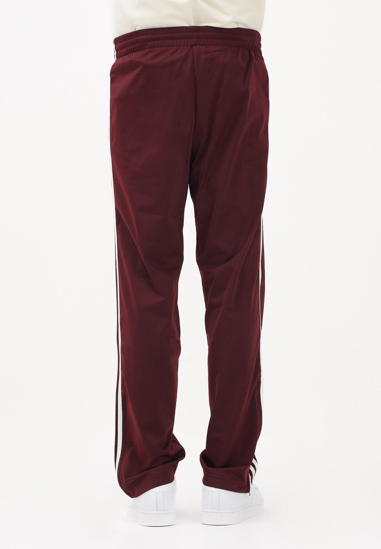 ADIDAS ORIGINALS Pantalone sportivo FIREBIRD bordeaux per uomo e donna KE1651 . ADIDAS ORIGINALS