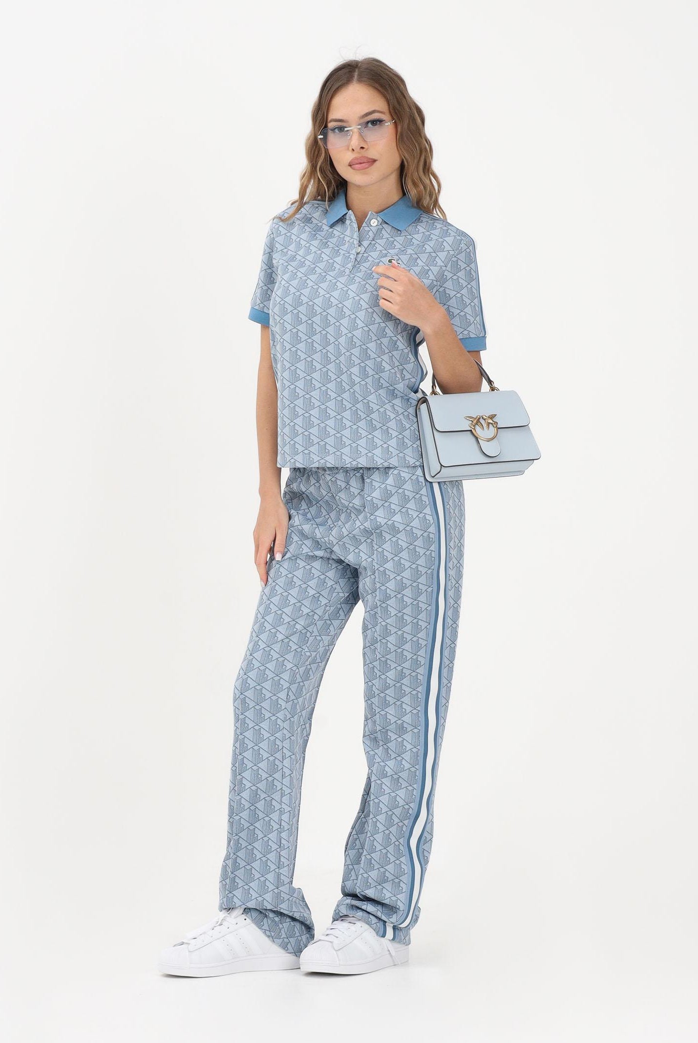 LACOSTE Pantalone sportivo azzurro da donna con motivo monogram XF9313 1QI LACOSTE