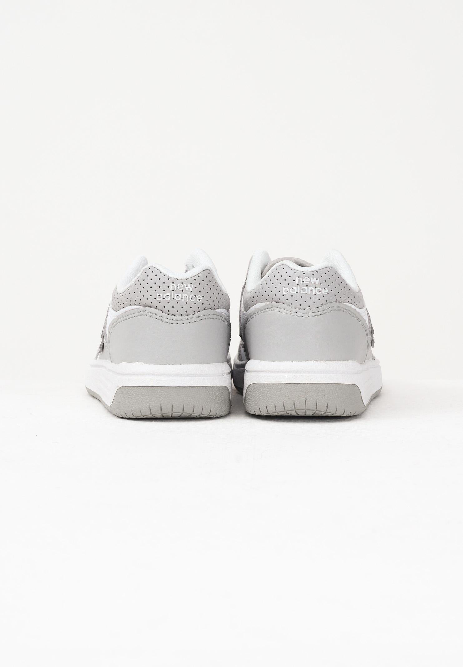 NEW BALANCE Sneakers 480 bianche e grigie per bambino e bambina PSB480WG NEW BALANCE