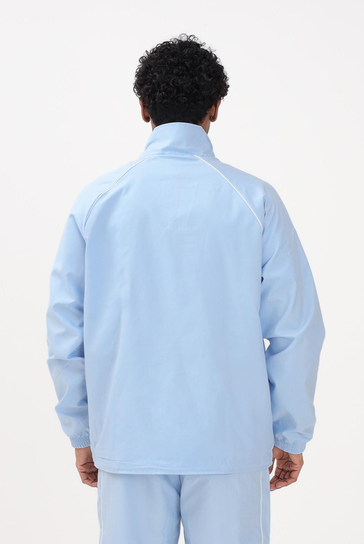 ADIDAS ORIGINALS Giacca a vento CHEST STRIPES celeste da uomo KE2164 . ADIDAS ORIGINALS