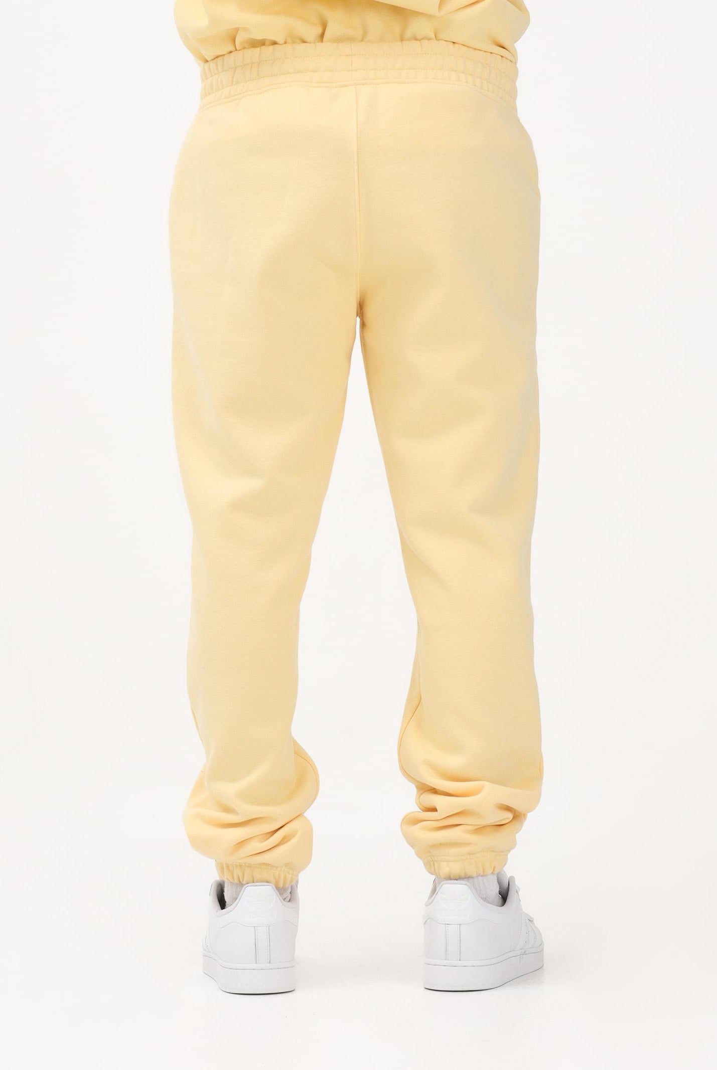 ADIDAS ORIGINALS Pantalone sportivo TREFOIL ESSENTIALS giallo per uomo e donna KE1159 . ADIDAS ORIGINALS